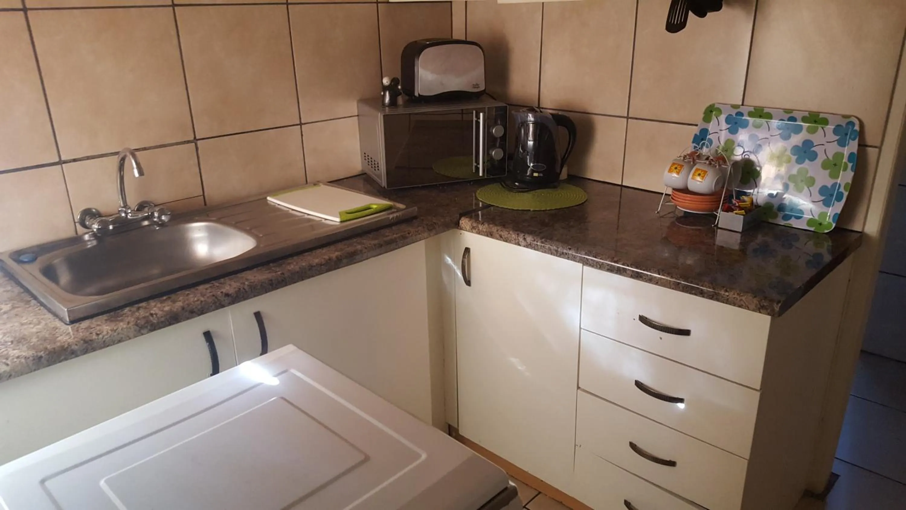 Kitchen or kitchenette in African Sky Guest House