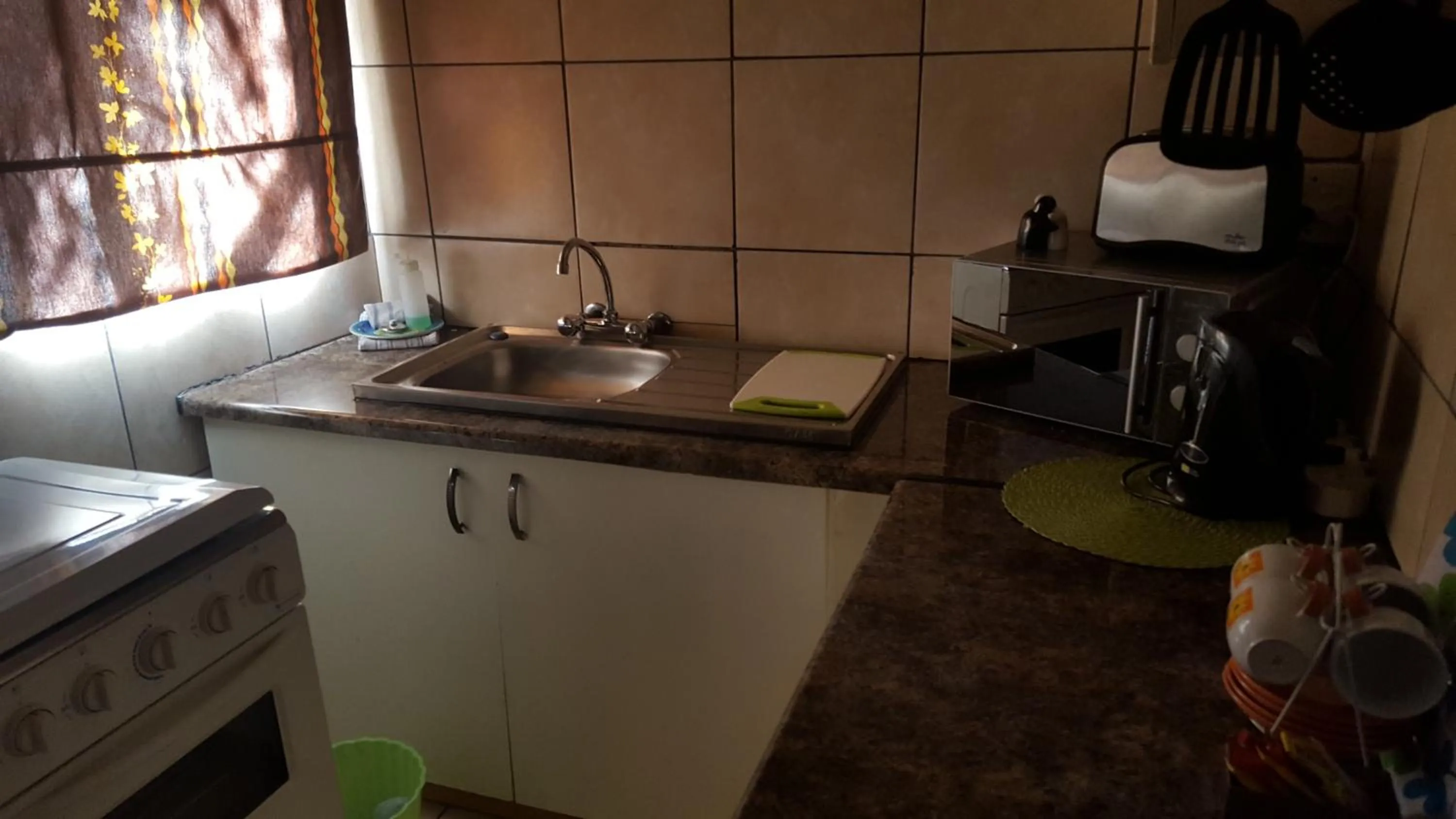 Kitchen or kitchenette in African Sky Guest House