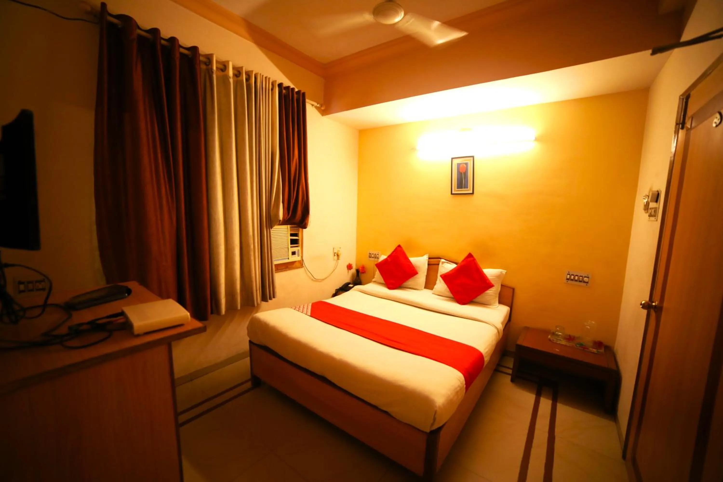 Bedroom in Hotel Vrundavan Residency