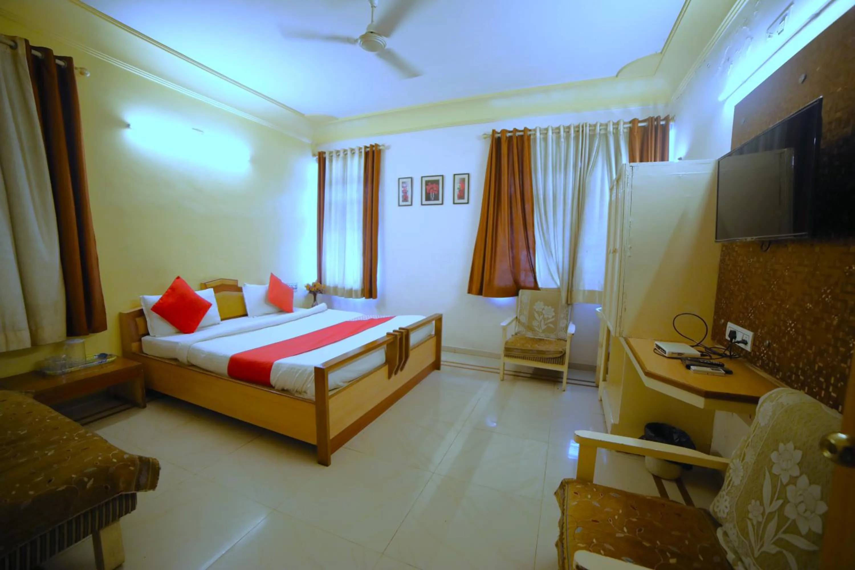 Bedroom in Hotel Vrundavan Residency