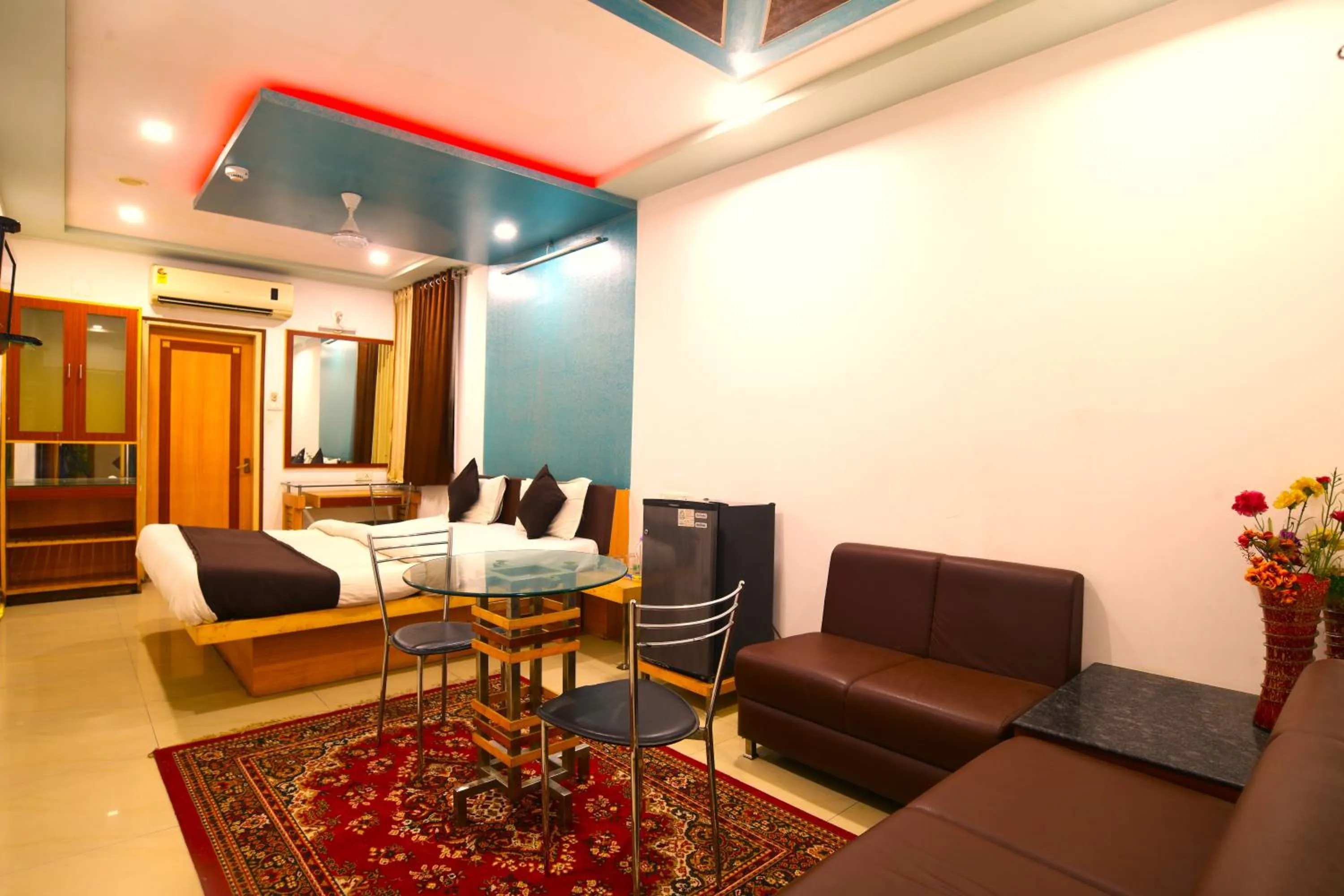 Bedroom in Hotel Vrundavan Residency