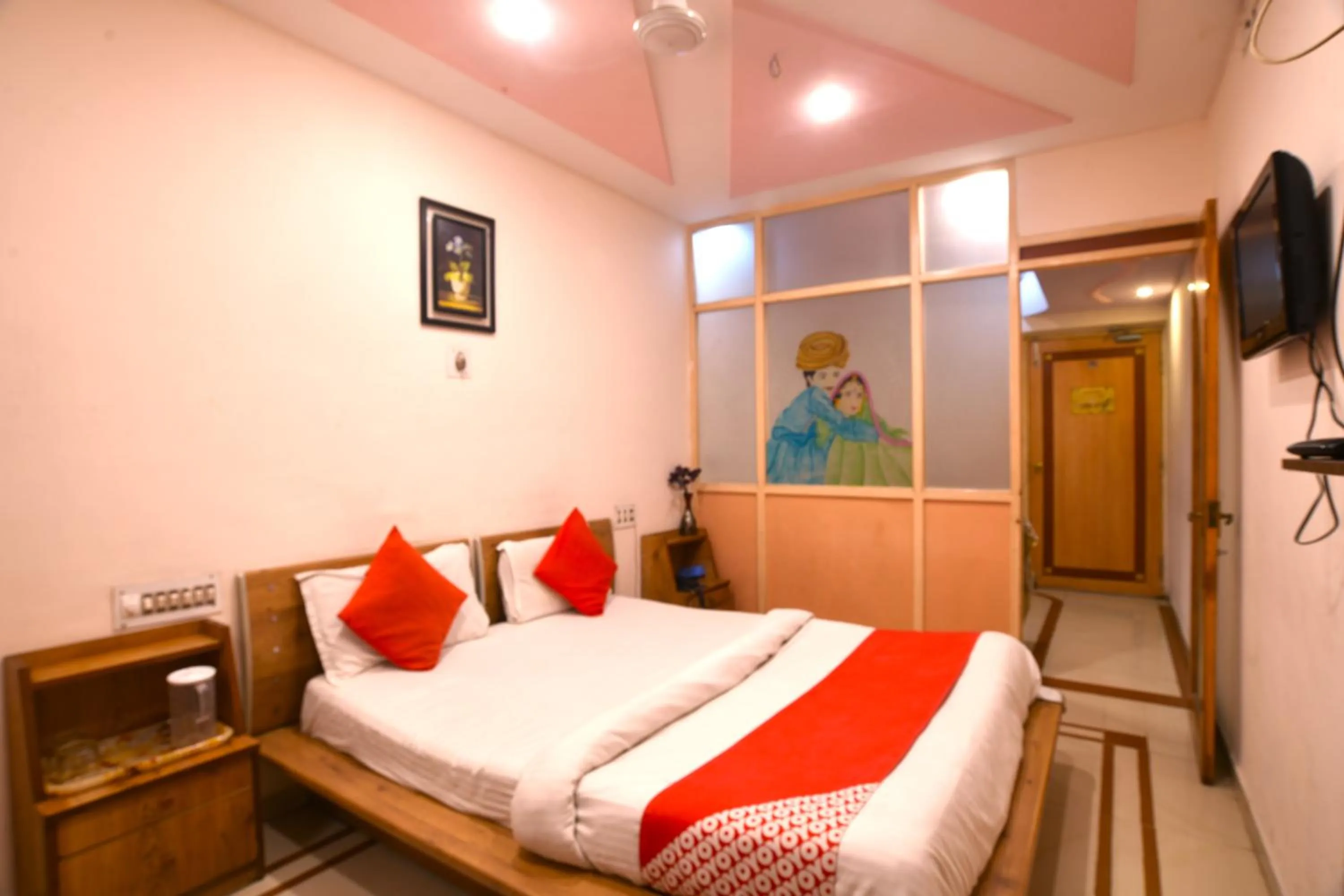 Bedroom in Hotel Vrundavan Residency