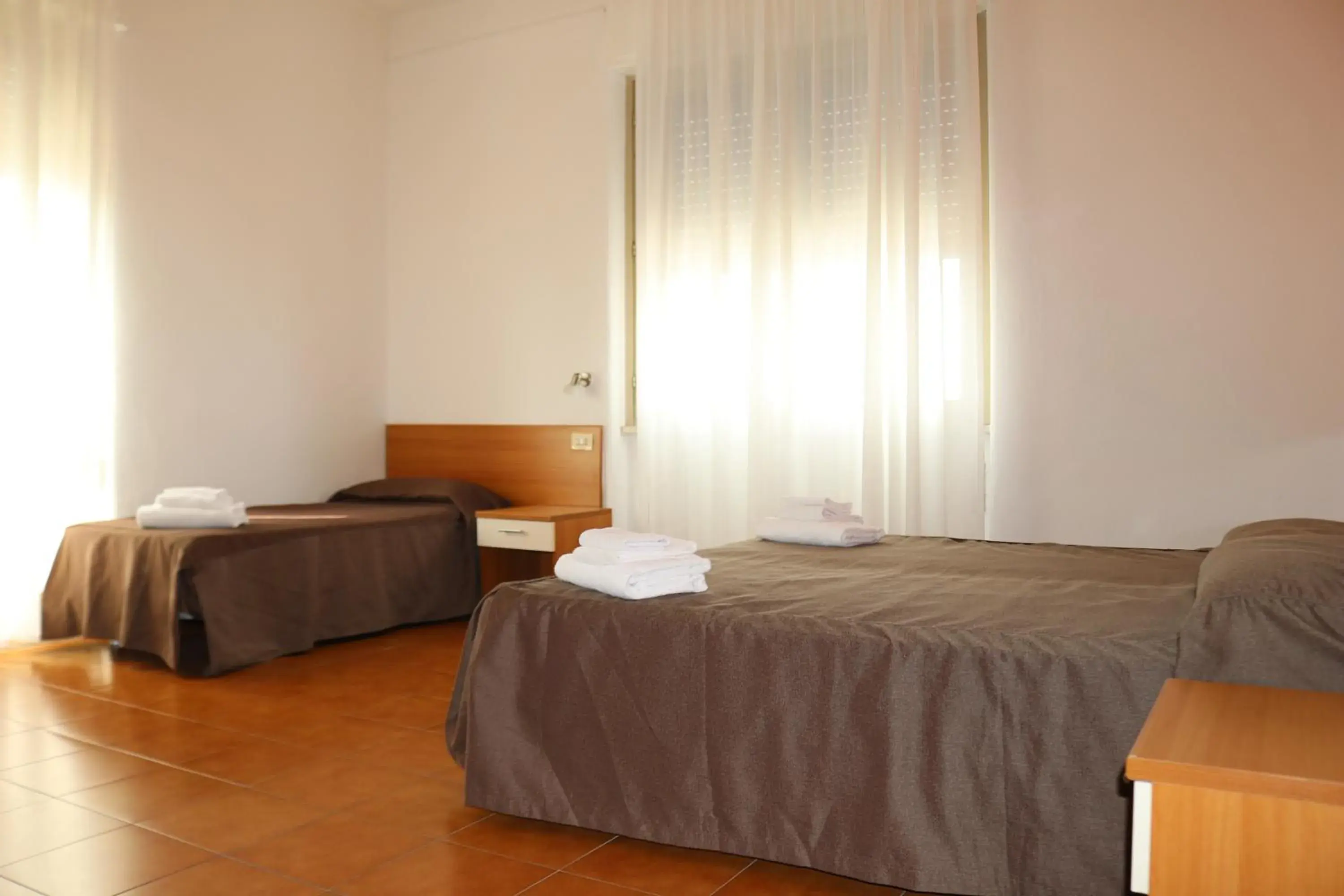 Standard Triple Room in Hotel Villa Trieste Standard Triple Room in Hotel Villa Trieste