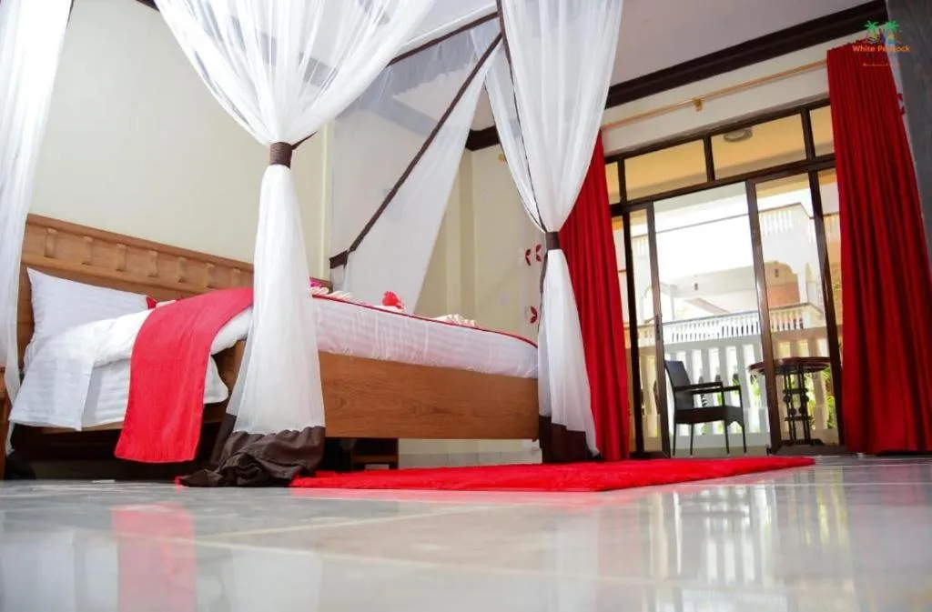 Bed in White Peacock Resort Mtwapa