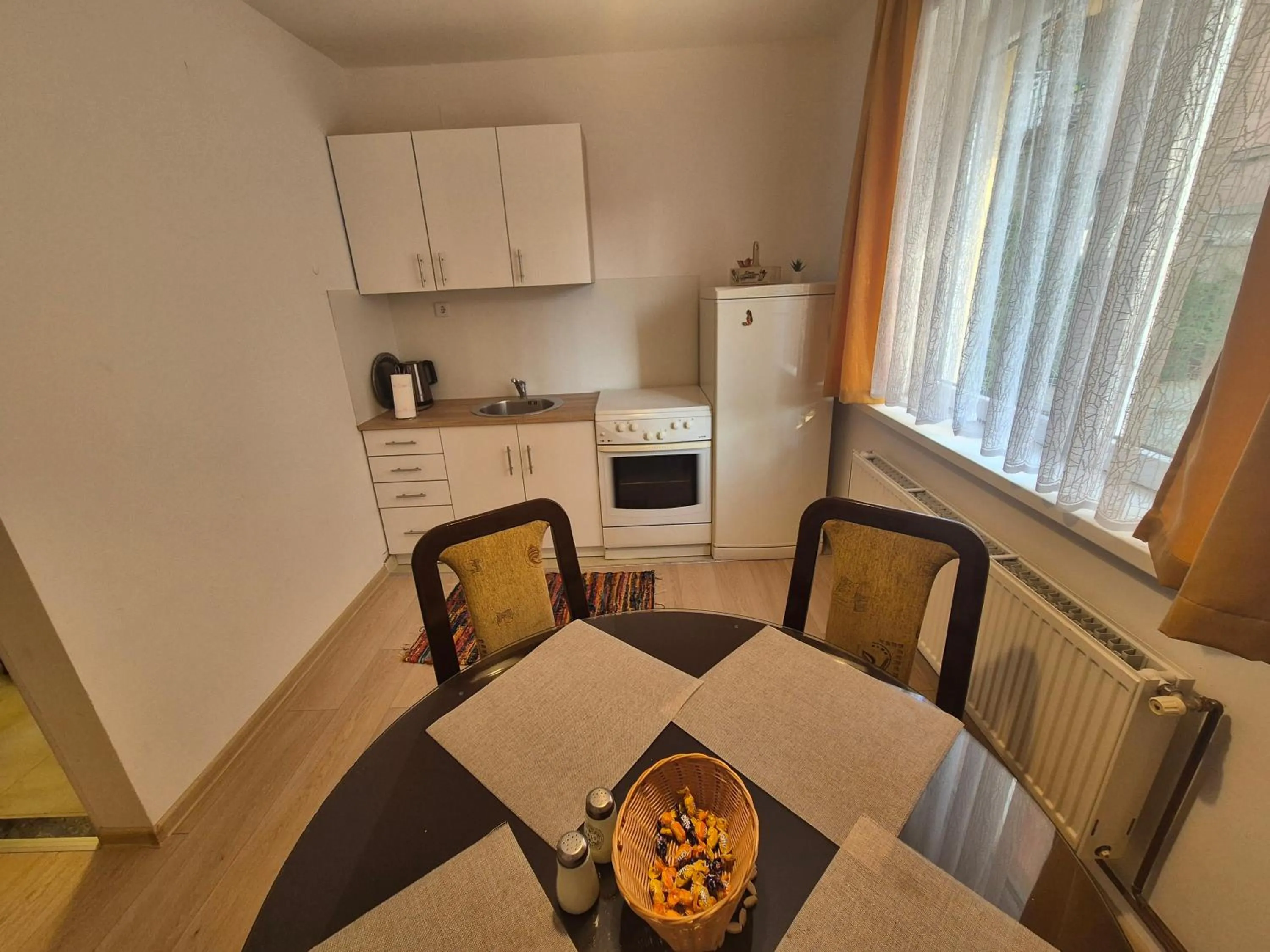 Dining area in Old Town Residence - Free parking