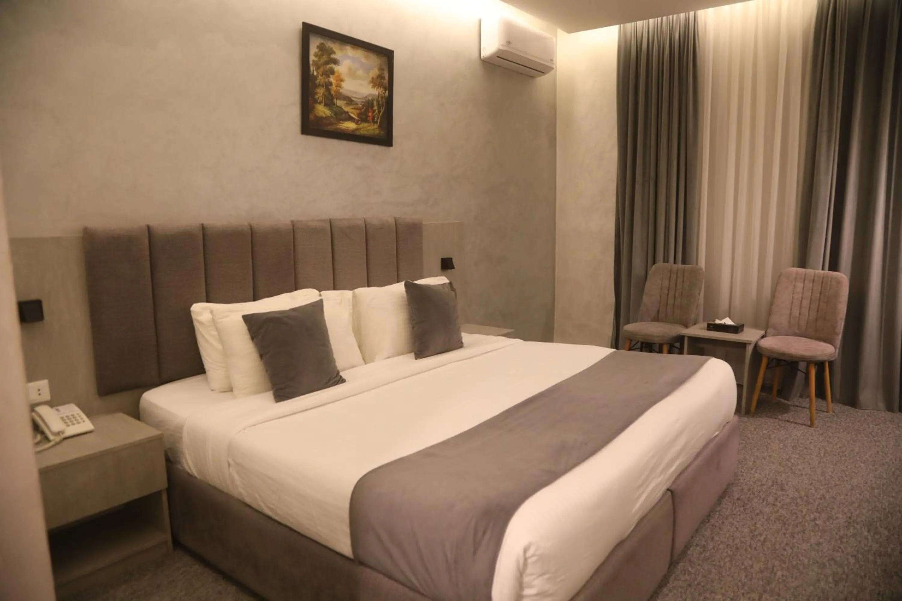 Bed in Kaya Hotel Amman