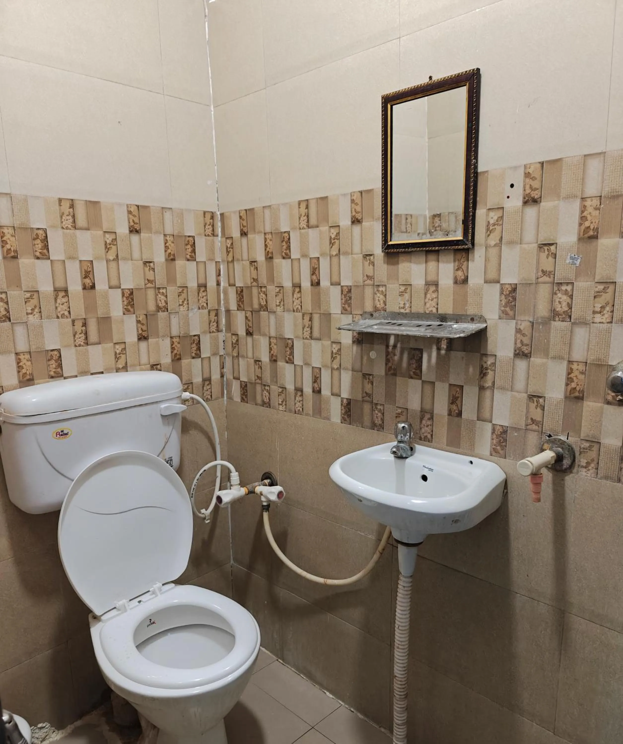 Toilet in Hotel Shikhar Inn