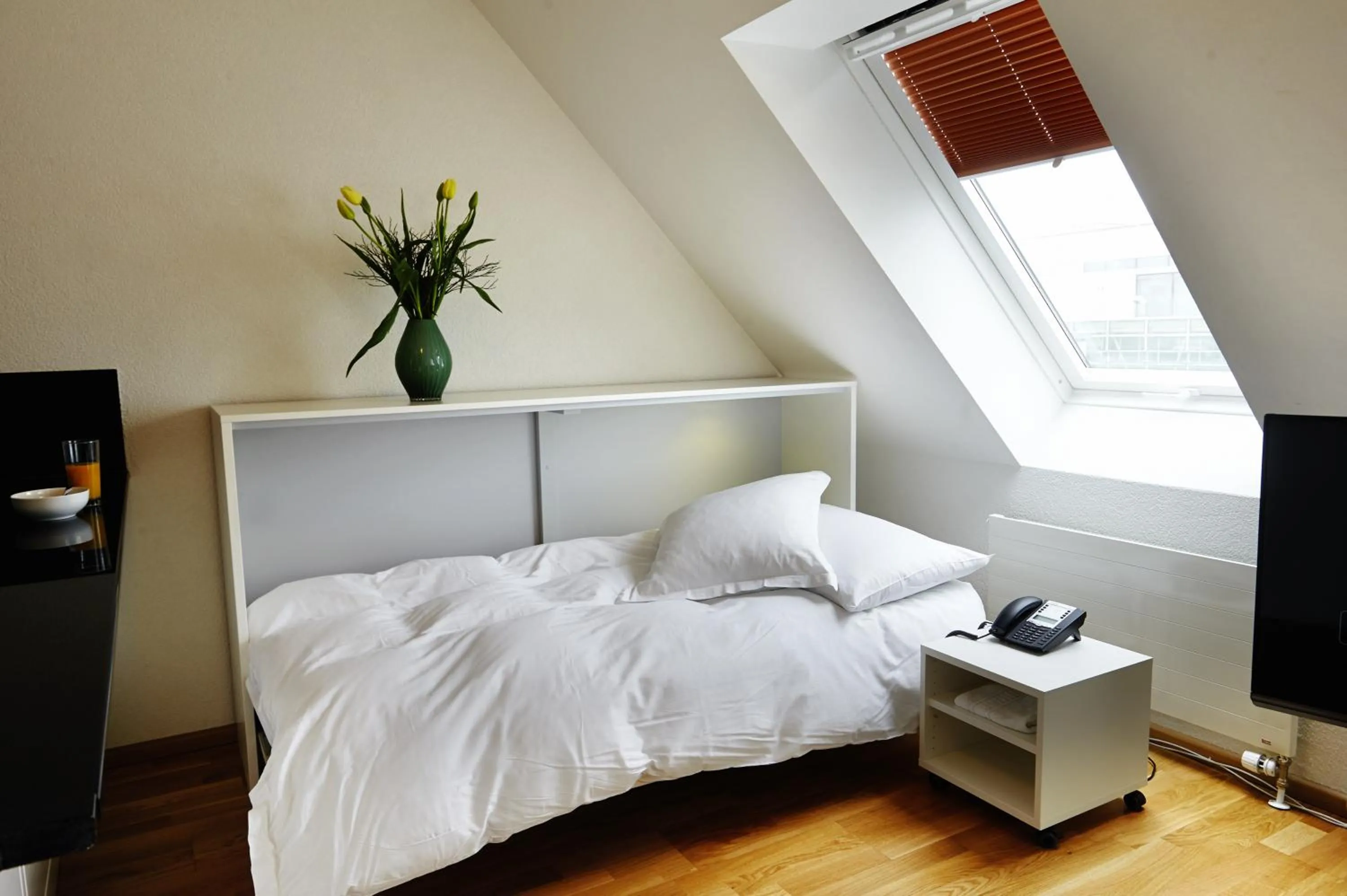 Living room in Residence Apartments by Hotel du Commerce