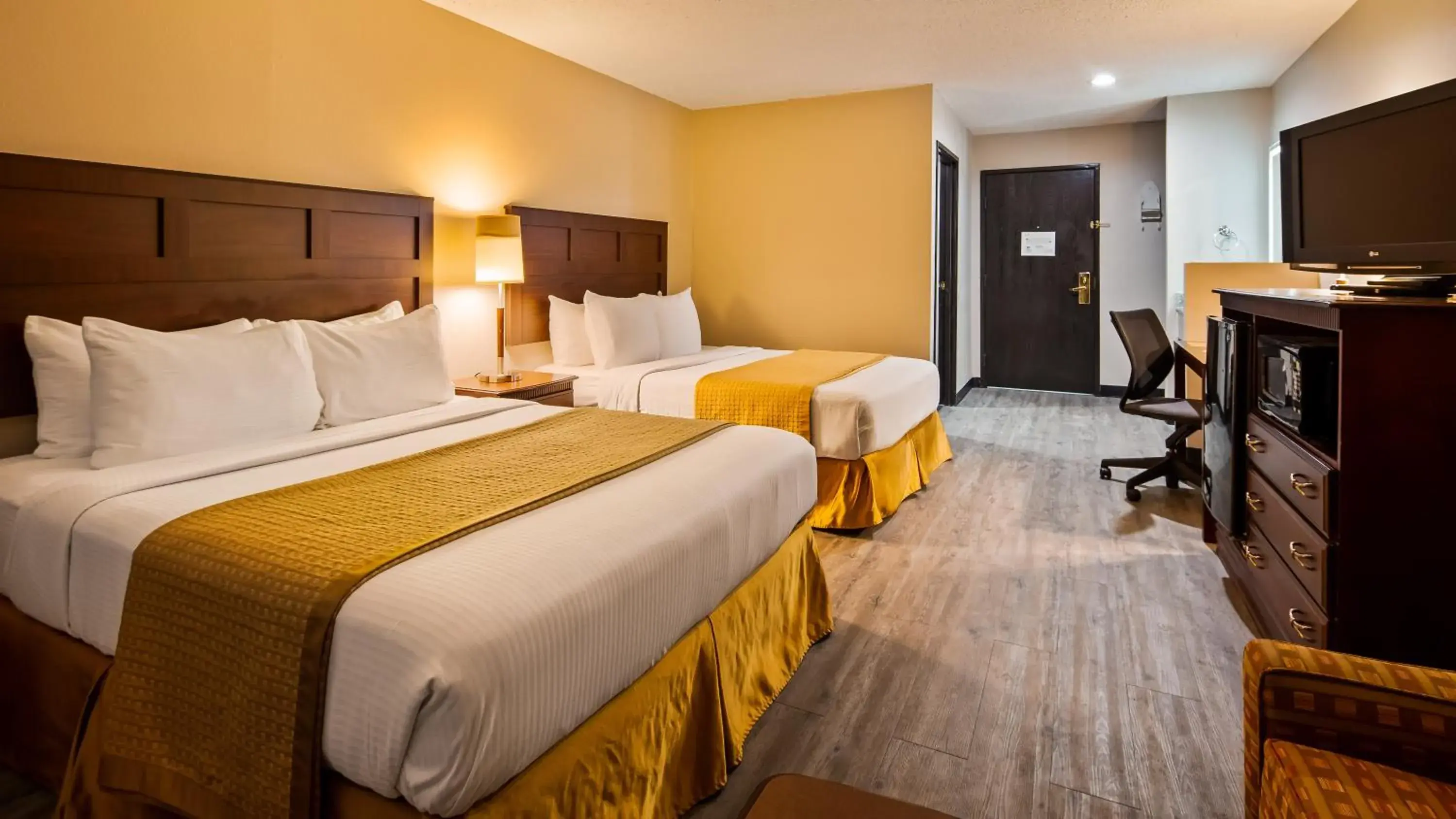 Queen Room with Two Queen Beds and Kitchenette in SureStay Hotel by Best Western Orange Queen Room with Two Queen Beds and Kitchenette in SureStay Hotel by Best Western Orange