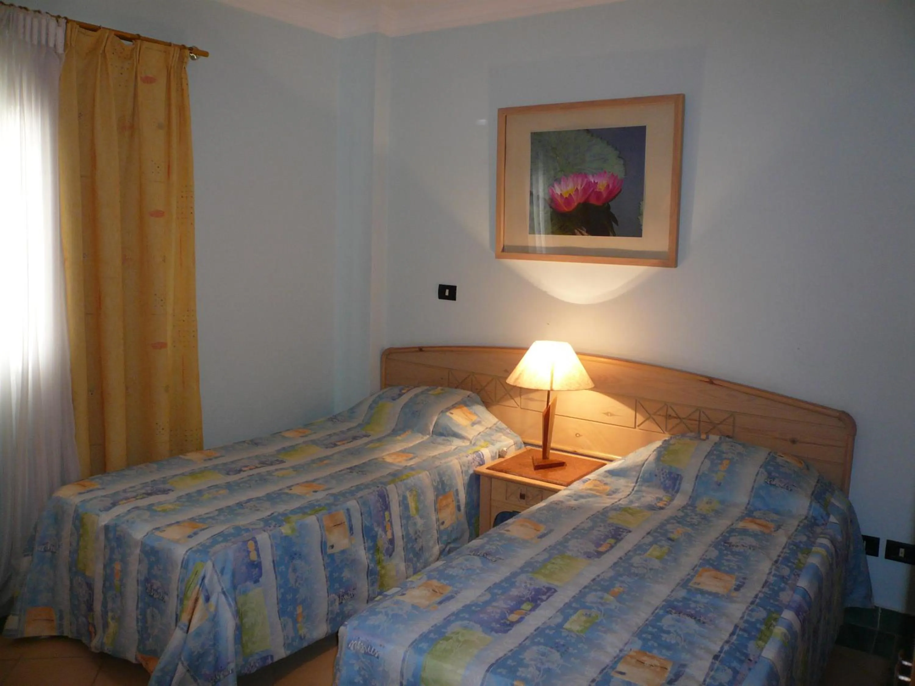 Bed in Logaina Sharm Resort Apartments