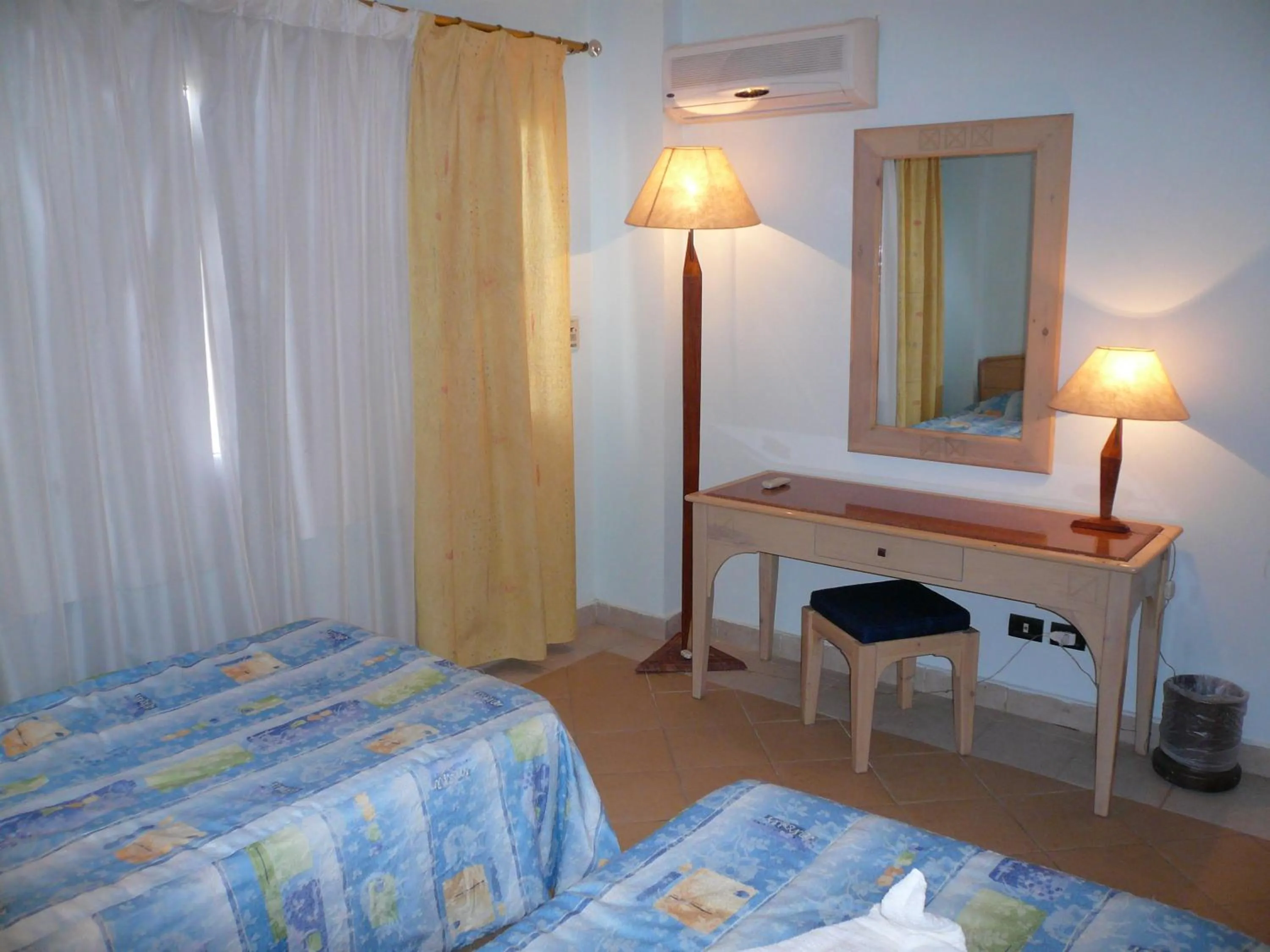 Bed in Logaina Sharm Resort Apartments