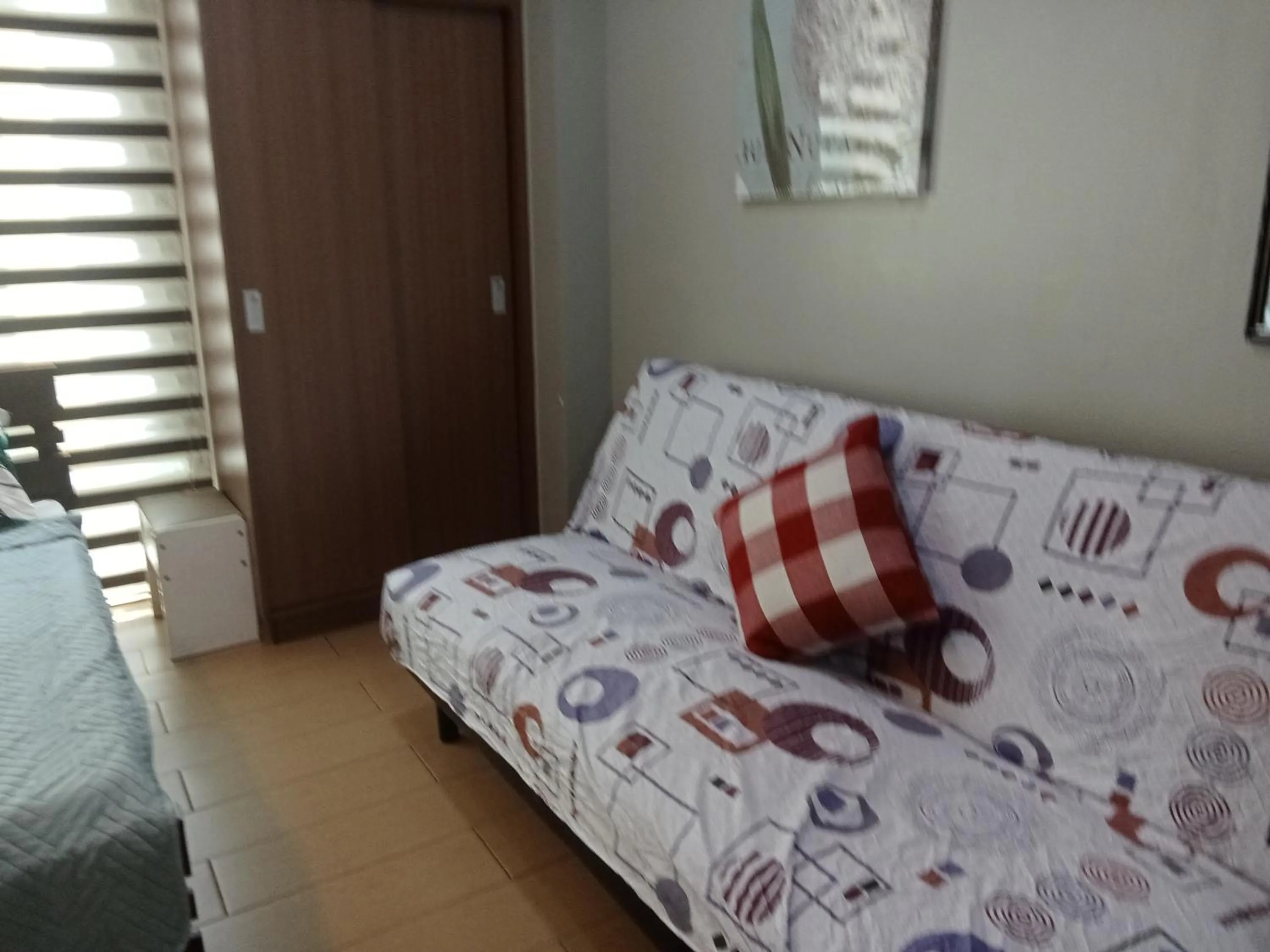 Bed in Henry's Newport Condotel