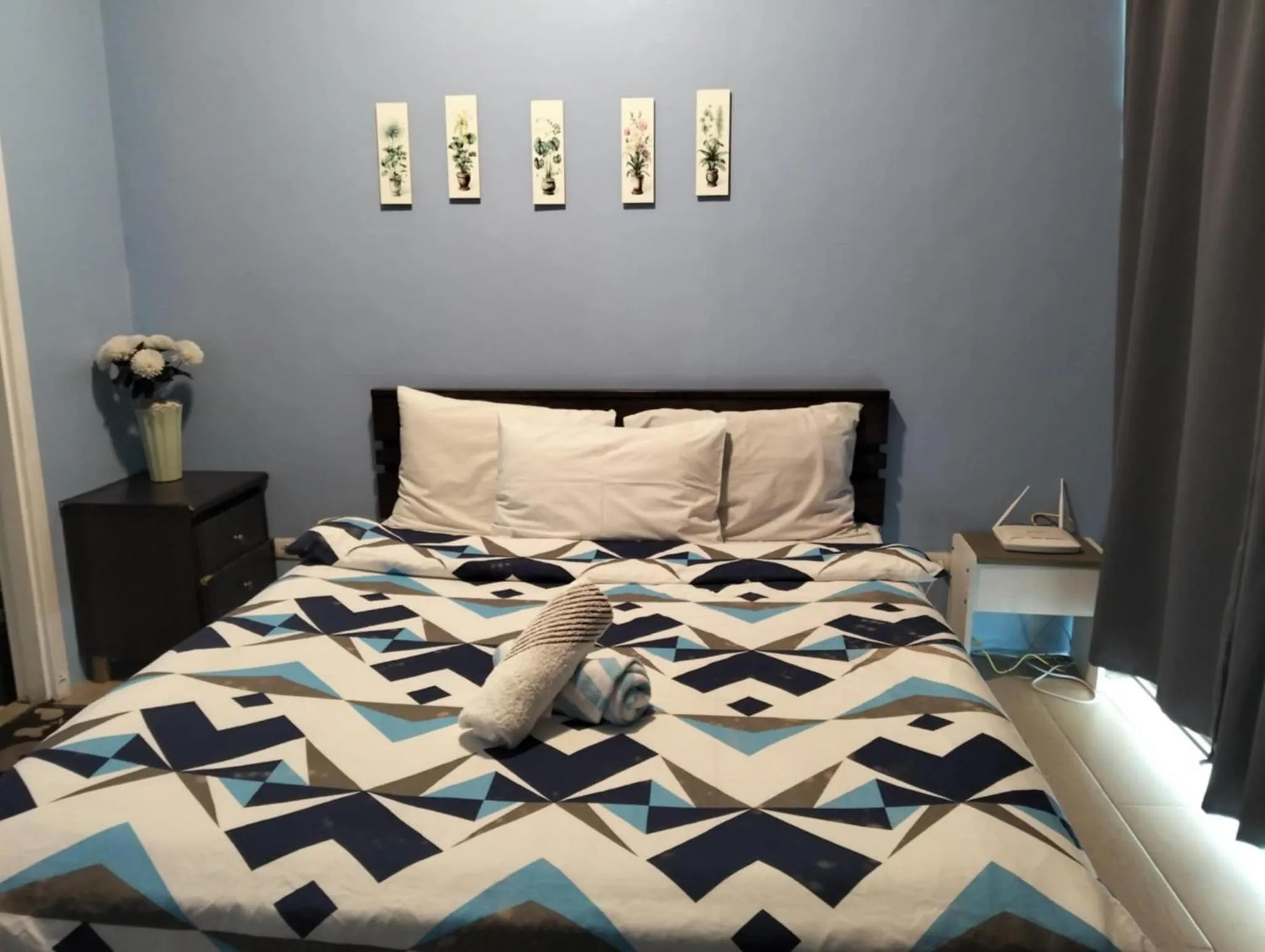 Bed in Henry's Newport Condotel