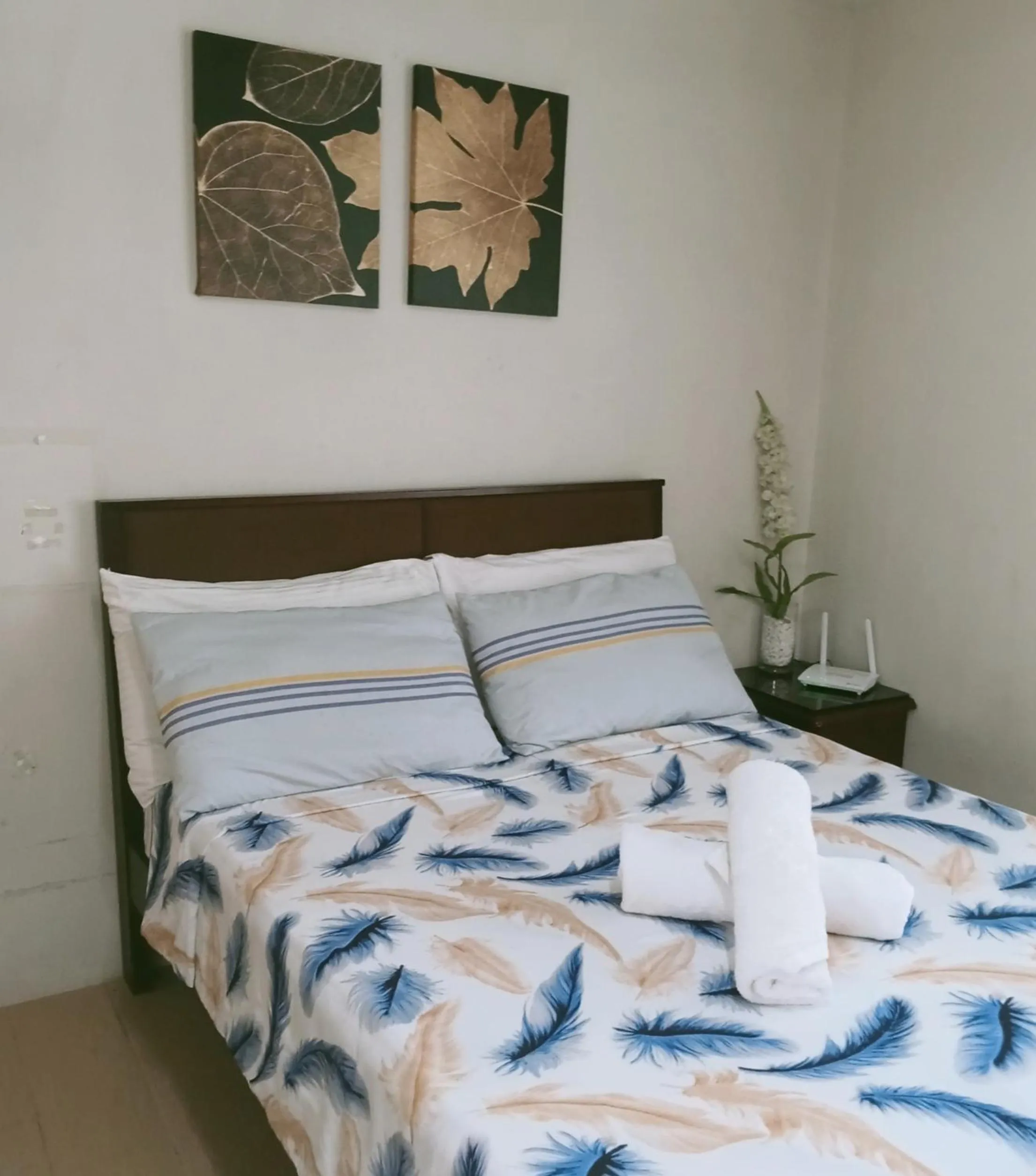 Bed in Henry's Newport Condotel