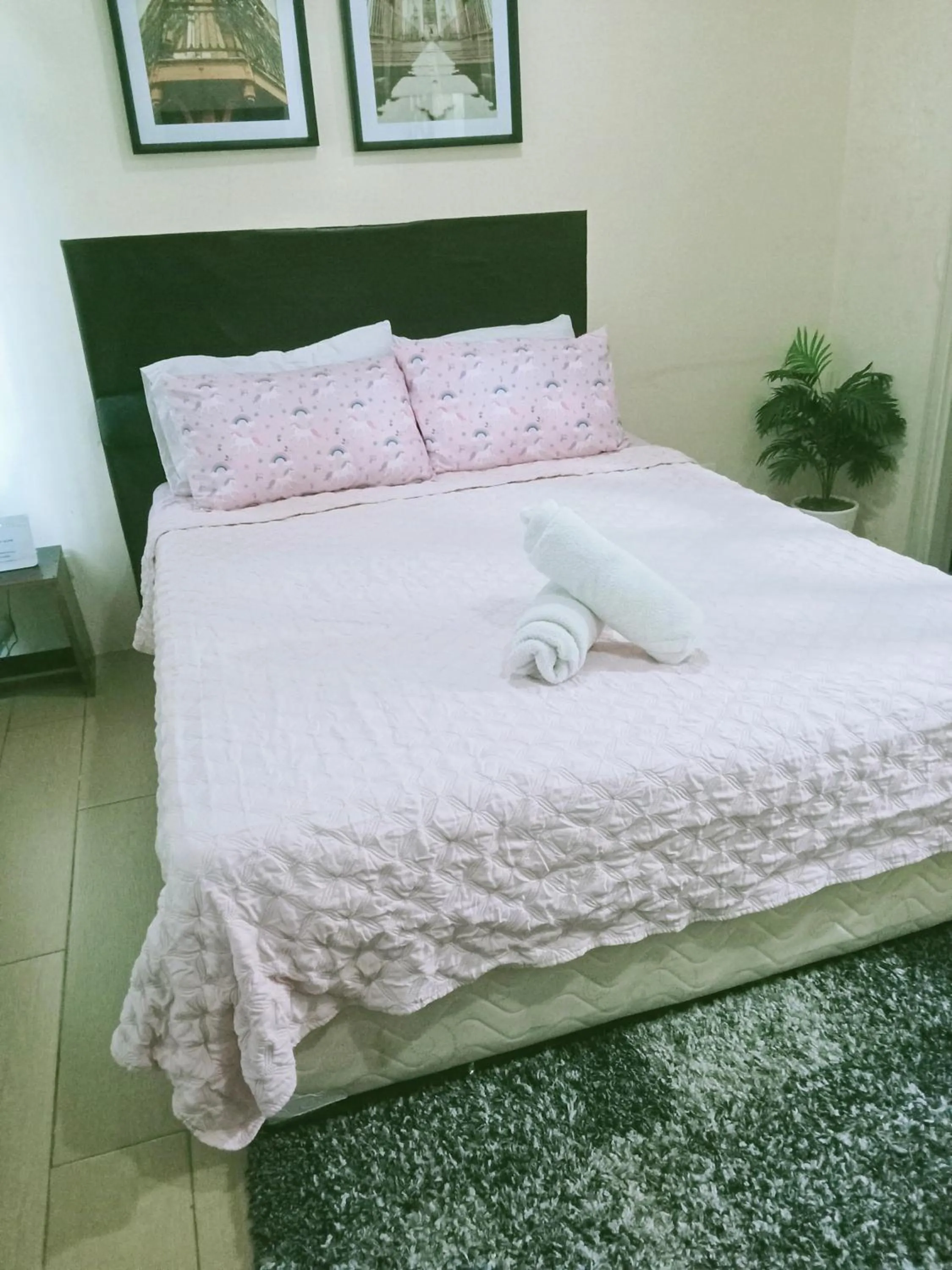 Bed in Henry's Newport Condotel