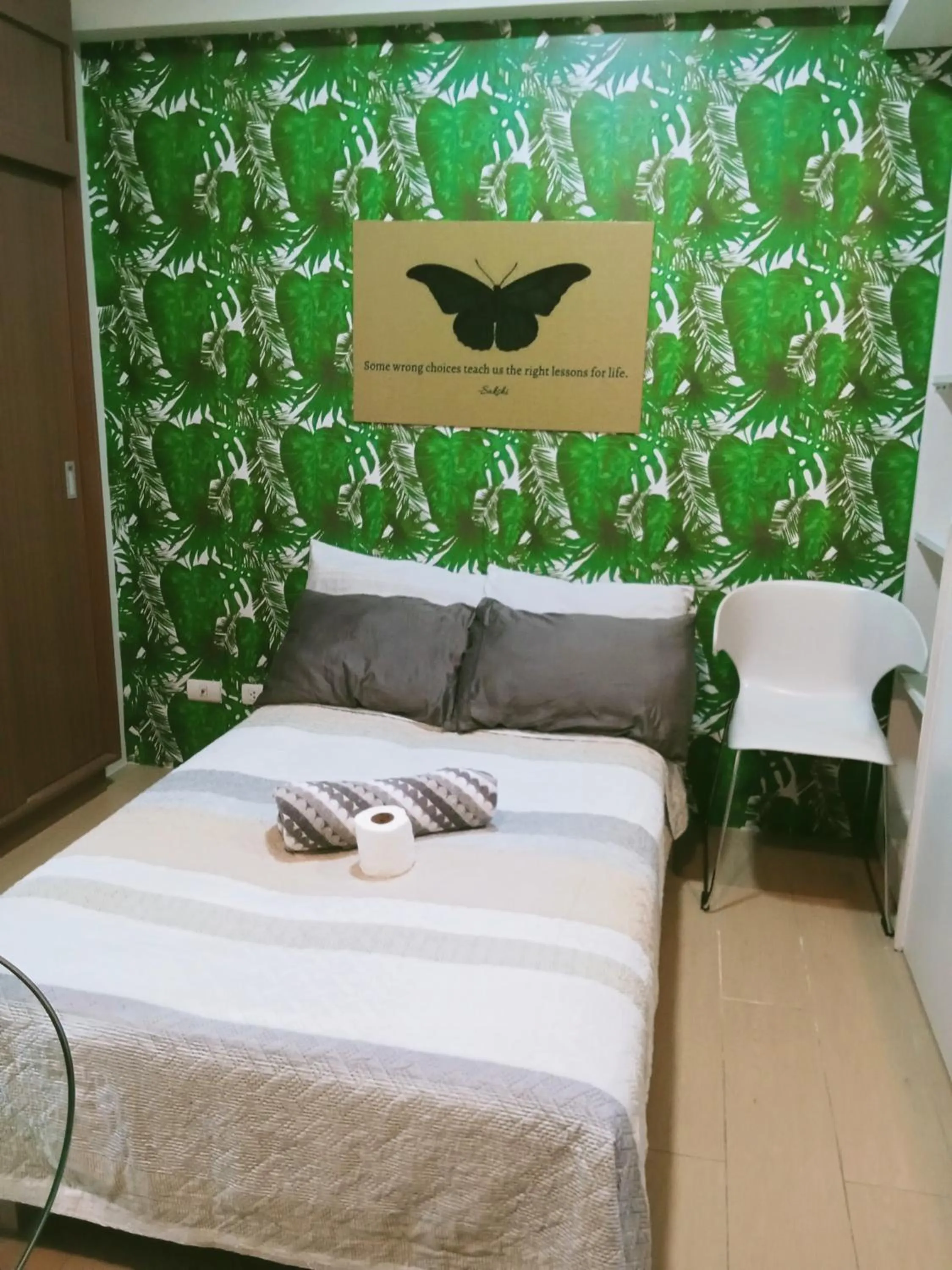 Bed in Henry's Newport Condotel