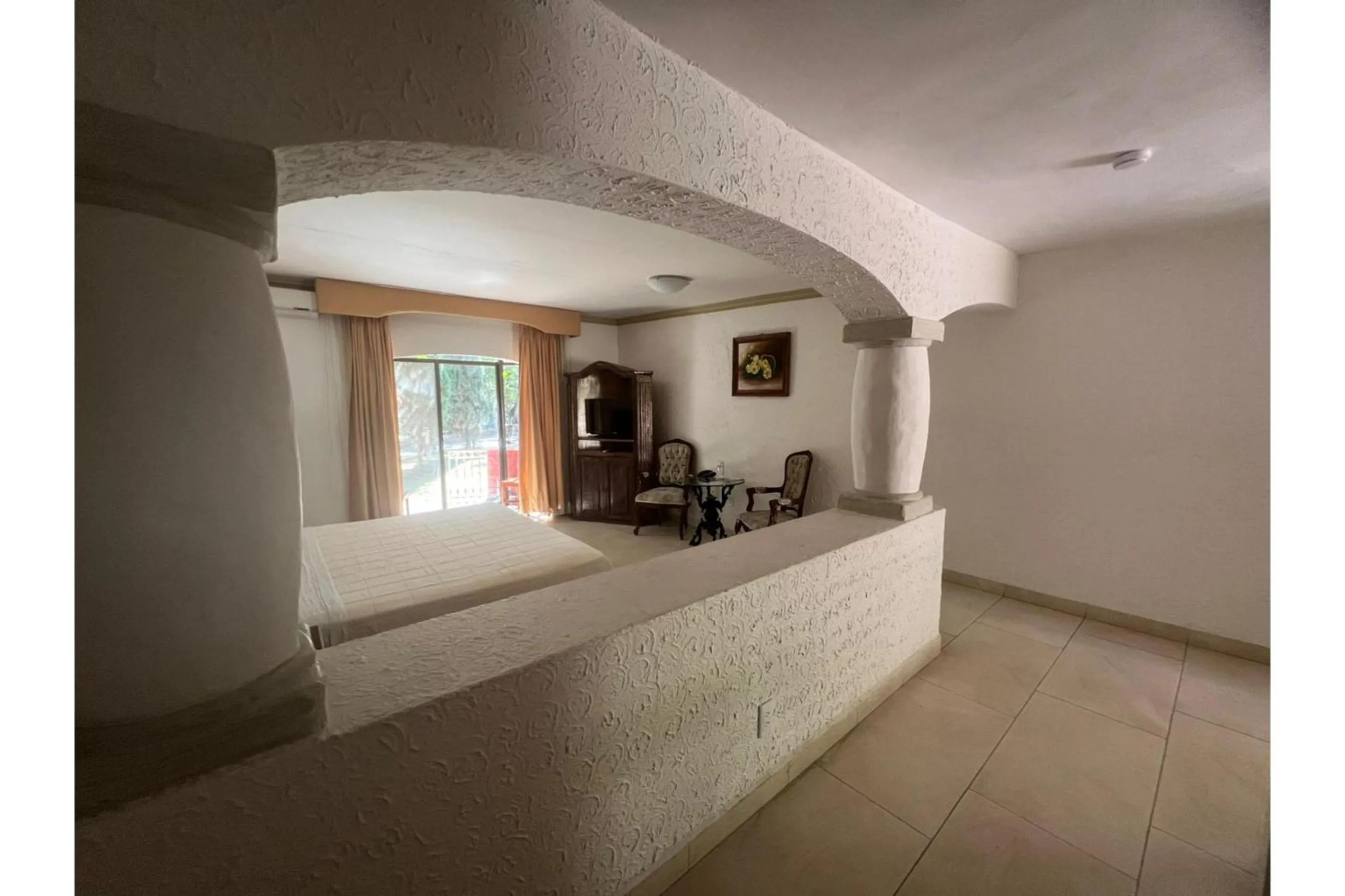 Bedroom in Capital O Gran Hotel Campestre