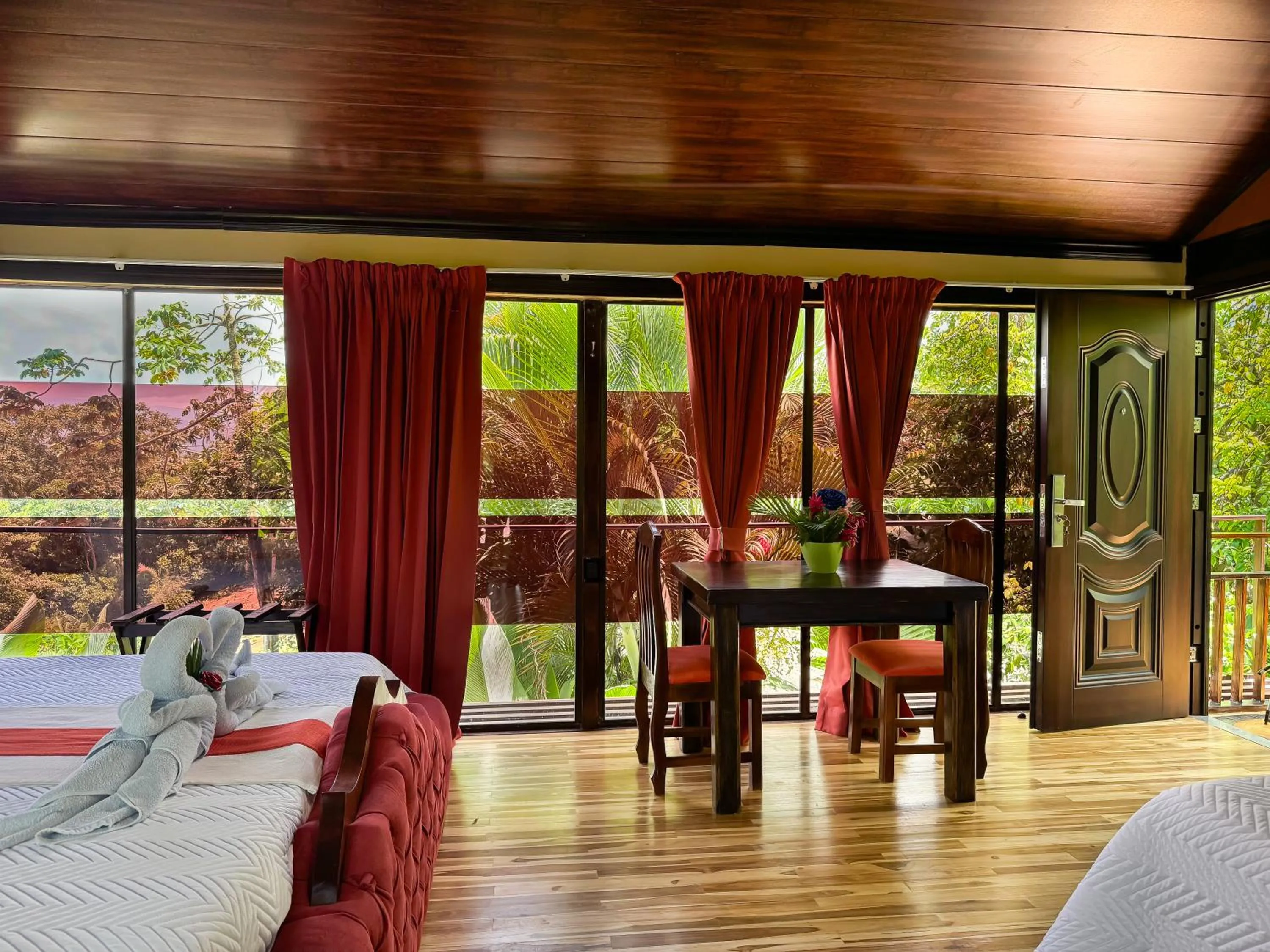 Bedroom in Hotel Heliconias Nature Inn & Hot Springs