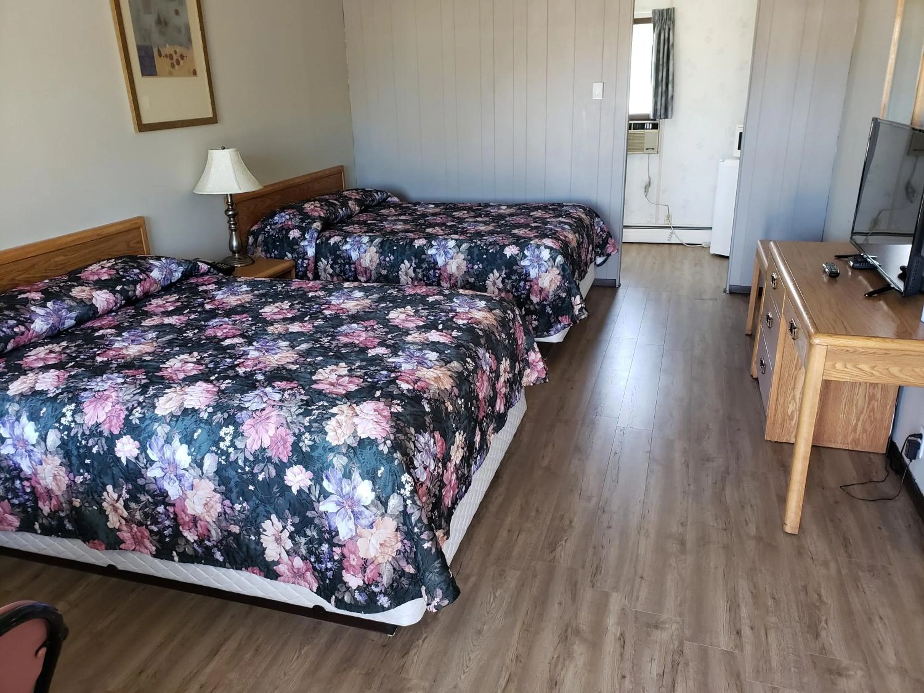 Bed in Rainbow Motel