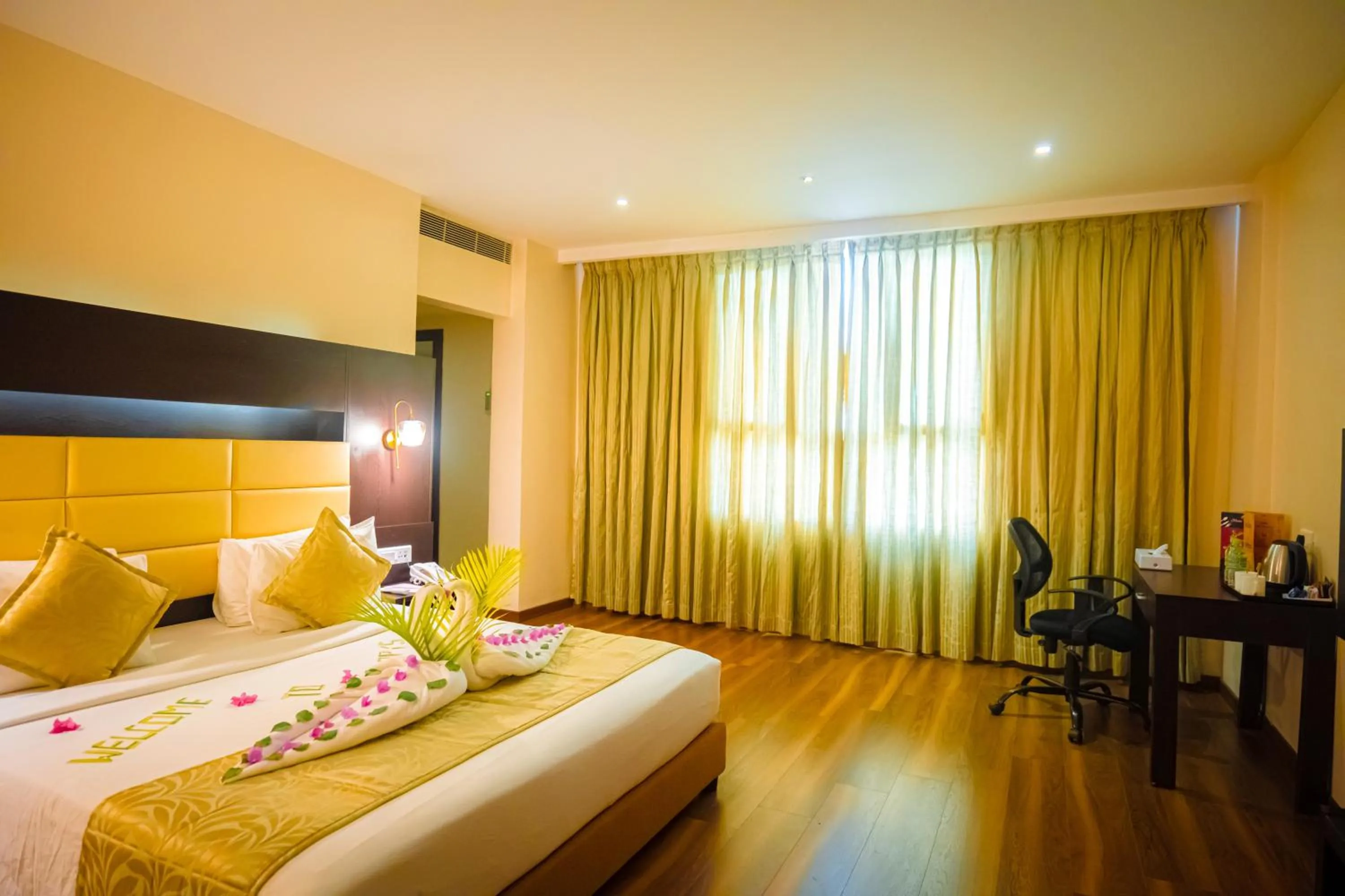 Bed in Poppys Hotel Madurai