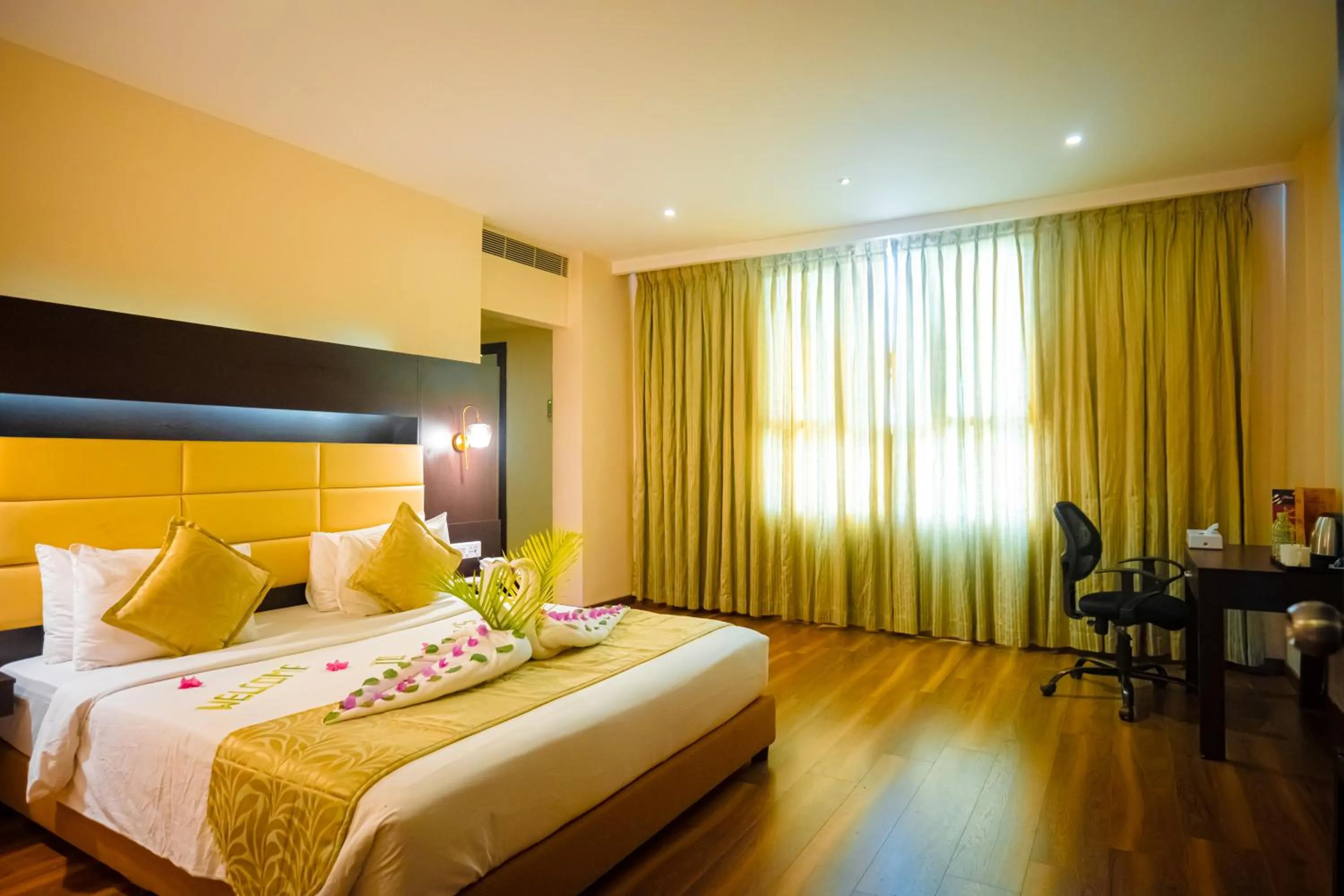 Bed in Poppys Hotel Madurai