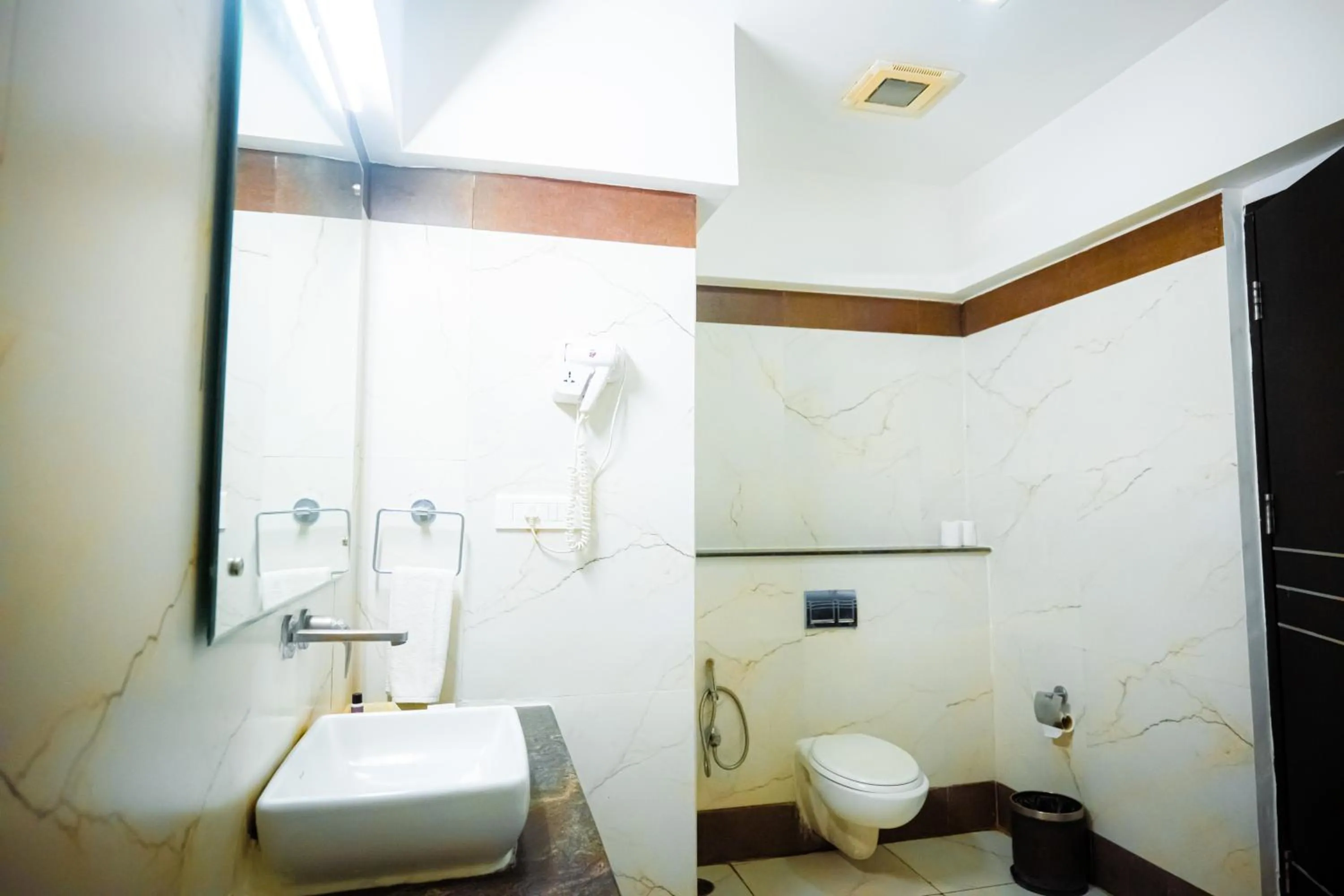 Bathroom in Poppys Hotel Madurai