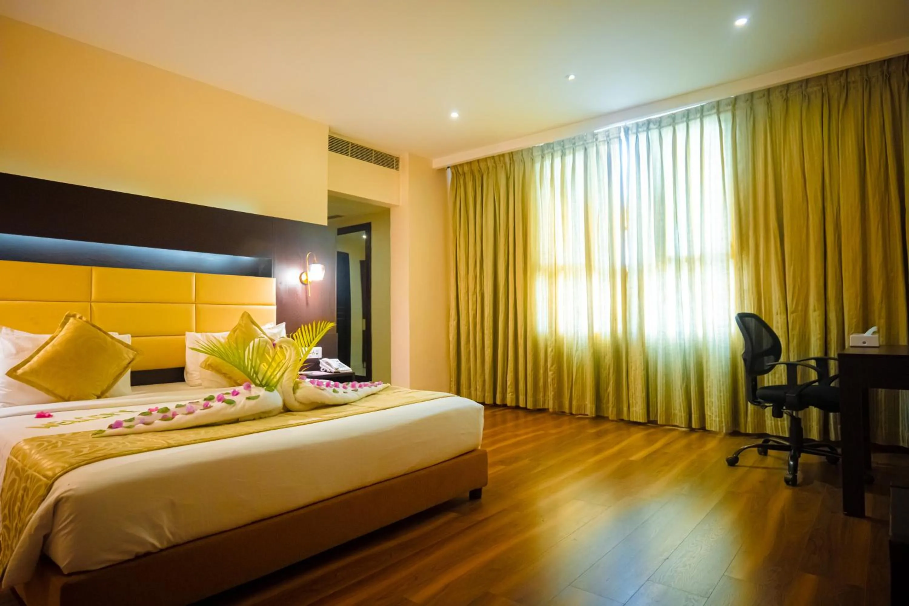 Bed in Poppys Hotel Madurai