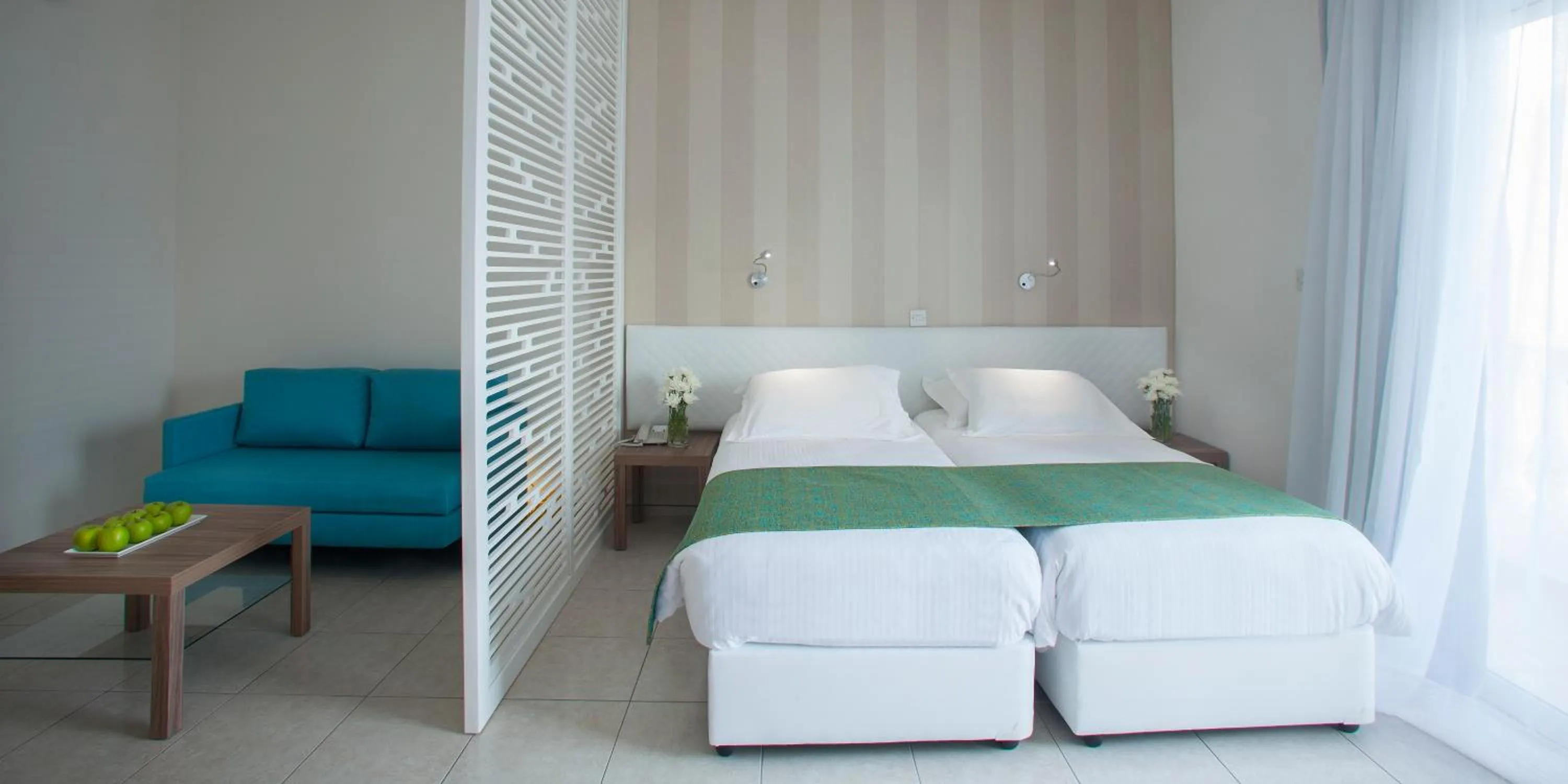 Bed in Princessa Vera Hotel Apartments