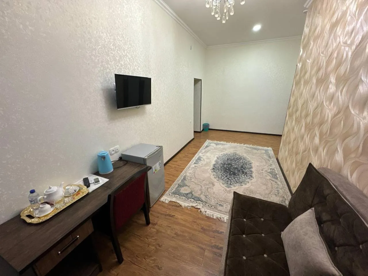 Seating area, Bed in RATMINA HOTEL