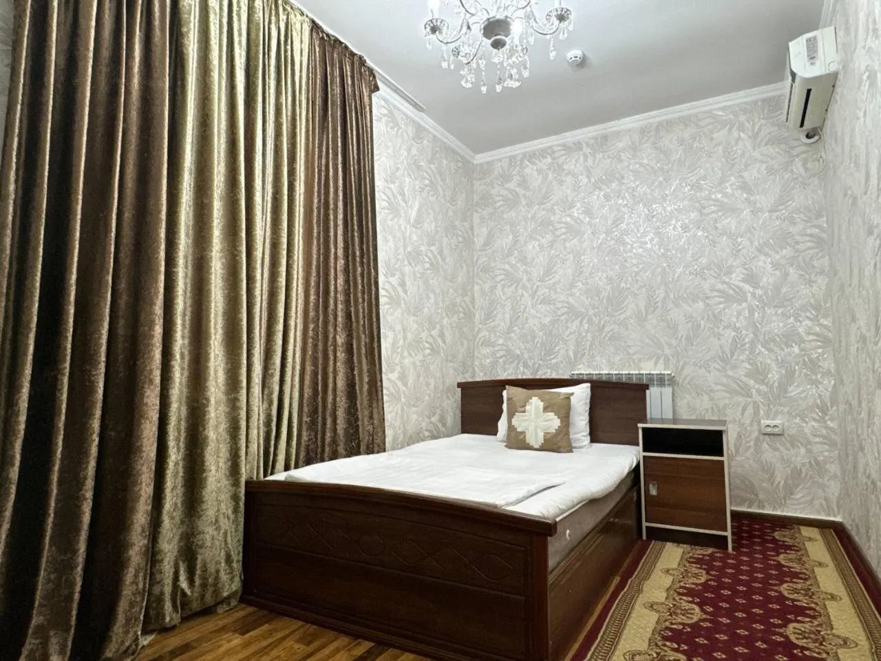 Bed in RATMINA HOTEL