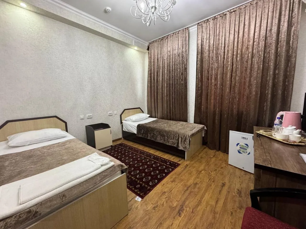 Bed in RATMINA HOTEL