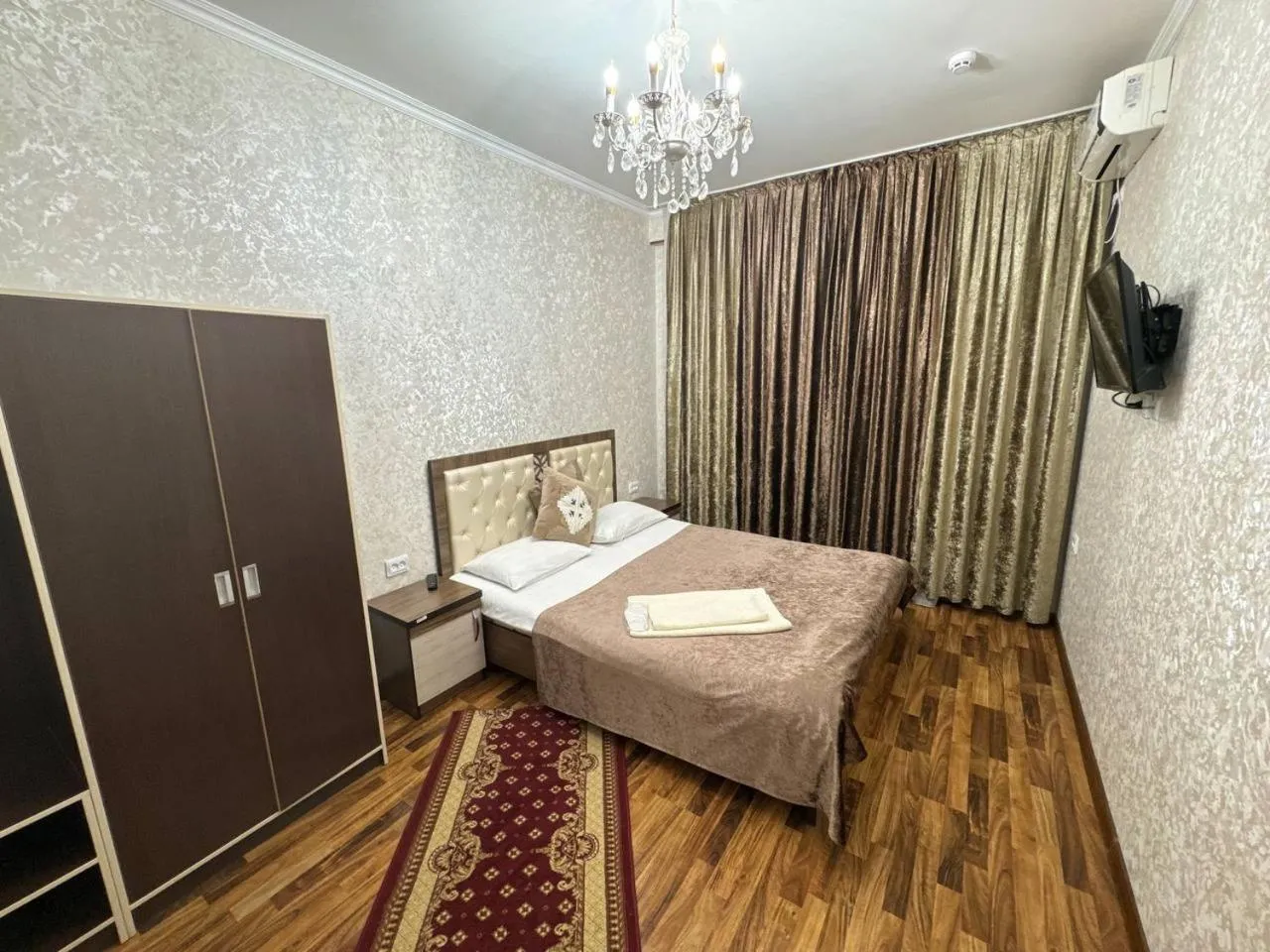 Bed in RATMINA HOTEL
