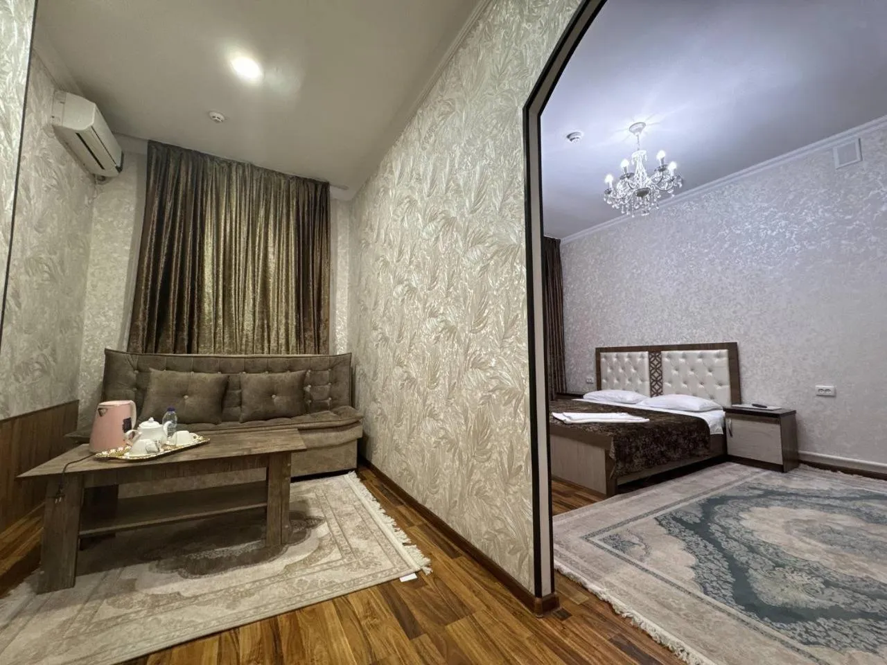 Living room, Bed in RATMINA HOTEL