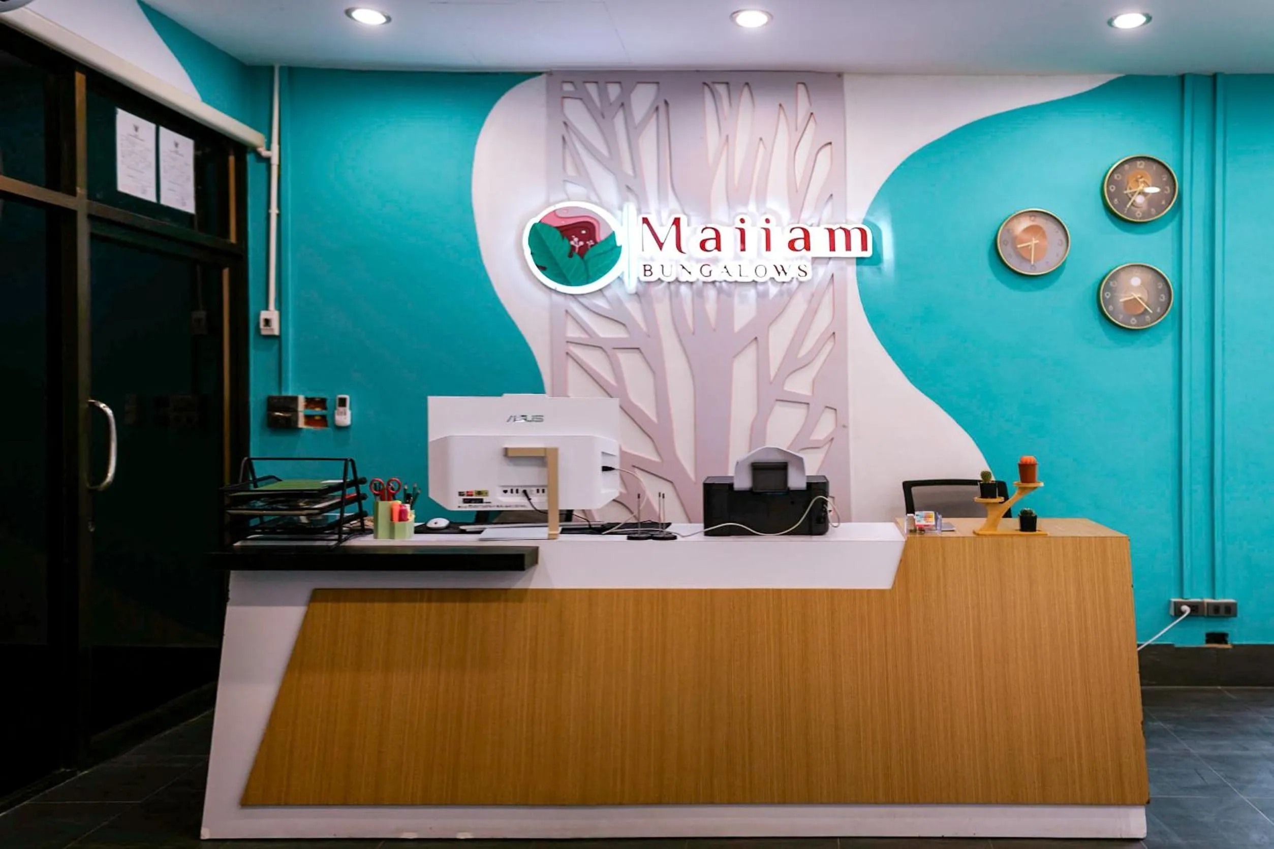 Property logo or sign in Maiiam Bungalows Kata Beach