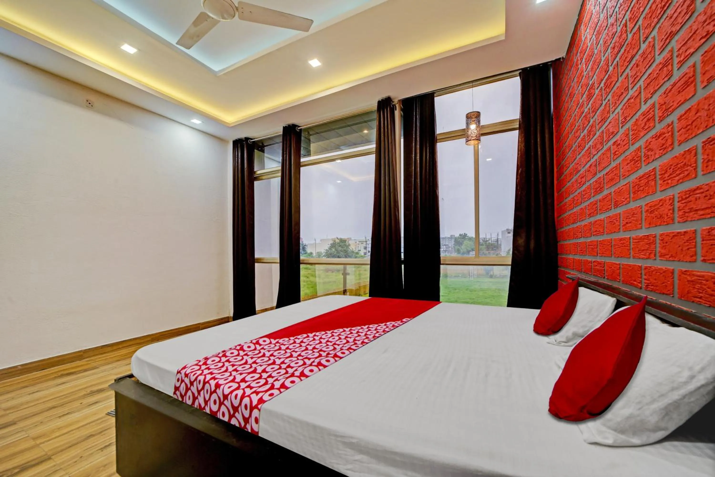 Bedroom, Bed in Super Hotel O Vachan Garden And Resort