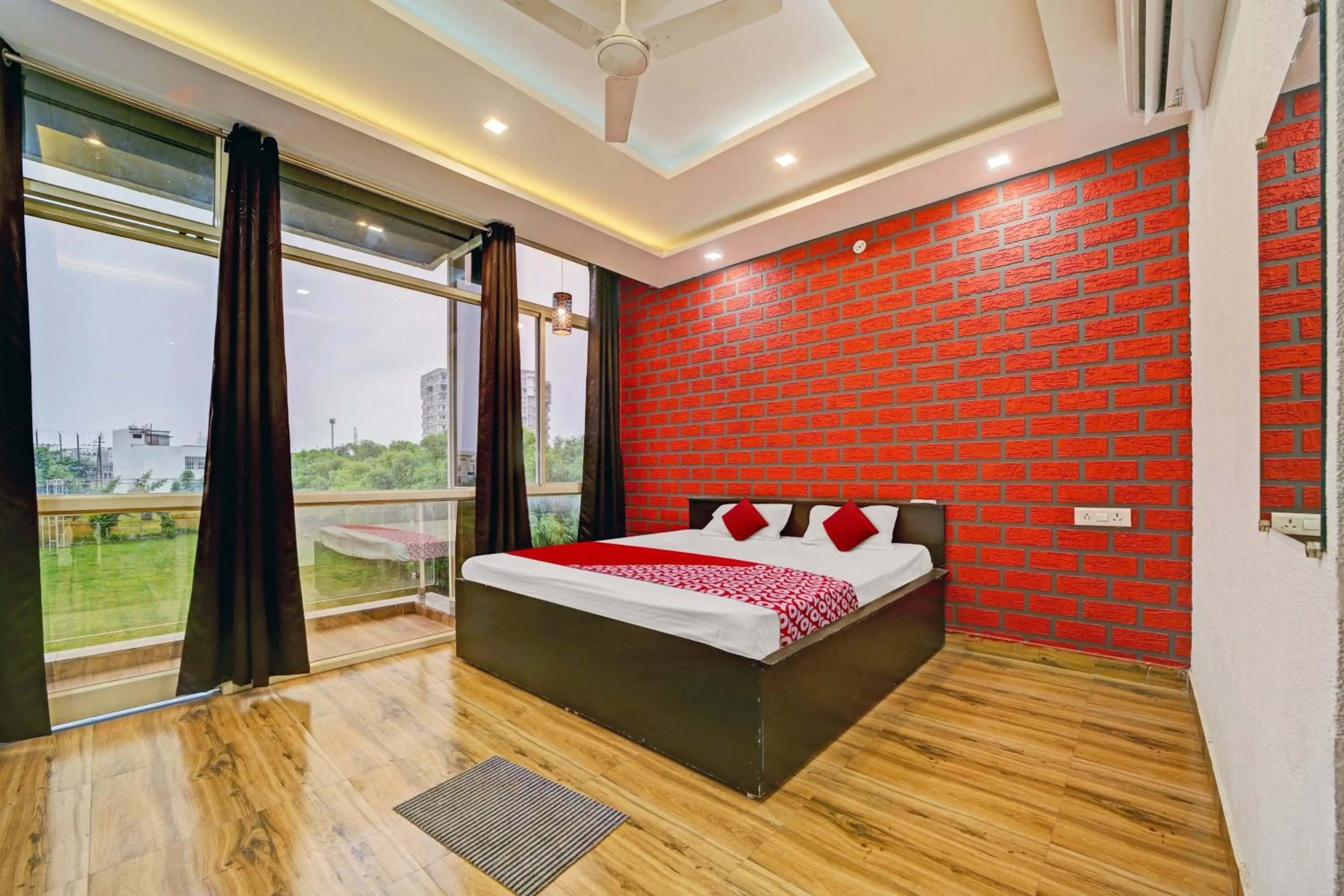 Bedroom, Bed in Super Hotel O Vachan Garden And Resort