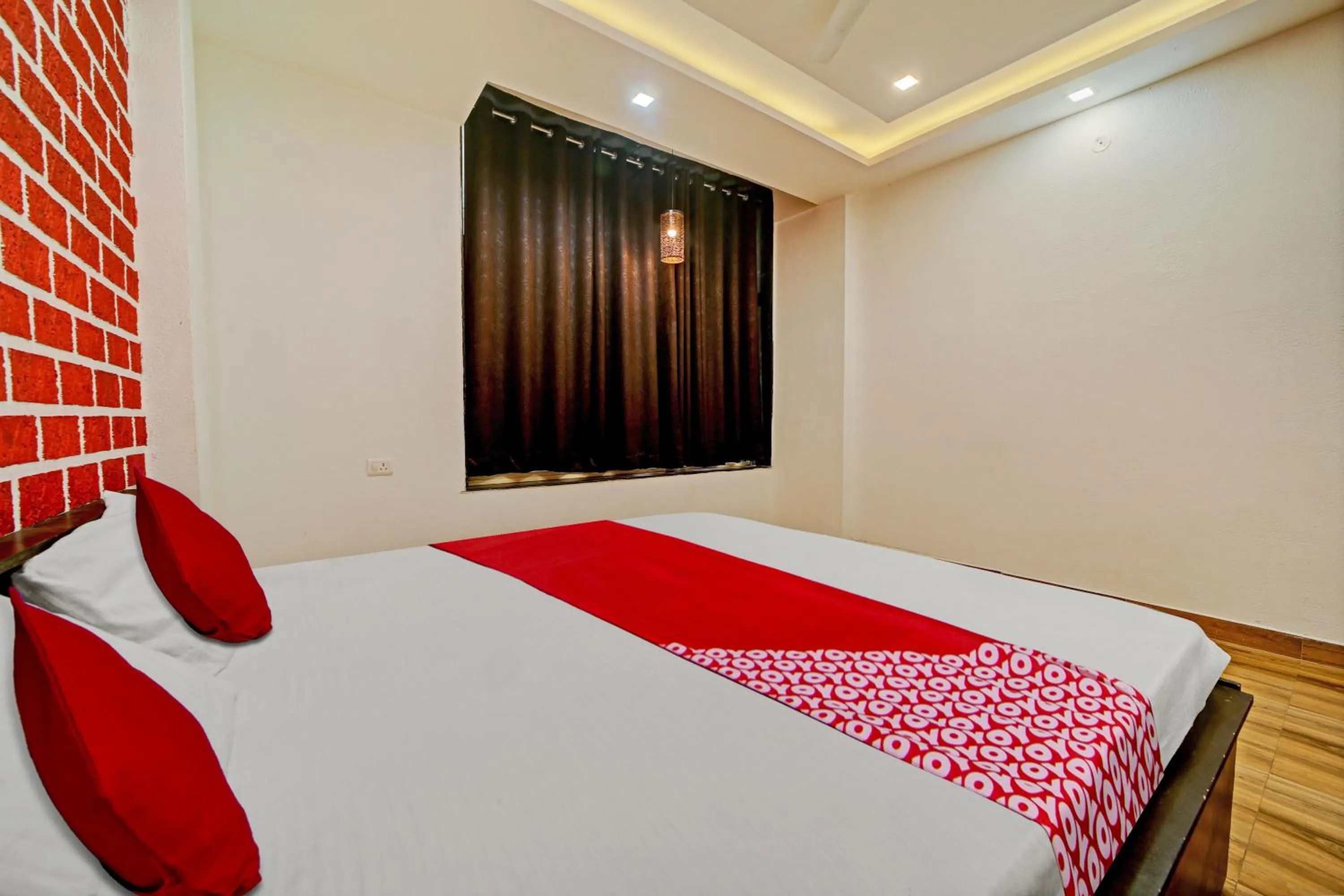 Bedroom, Bed in Super Hotel O Vachan Garden And Resort