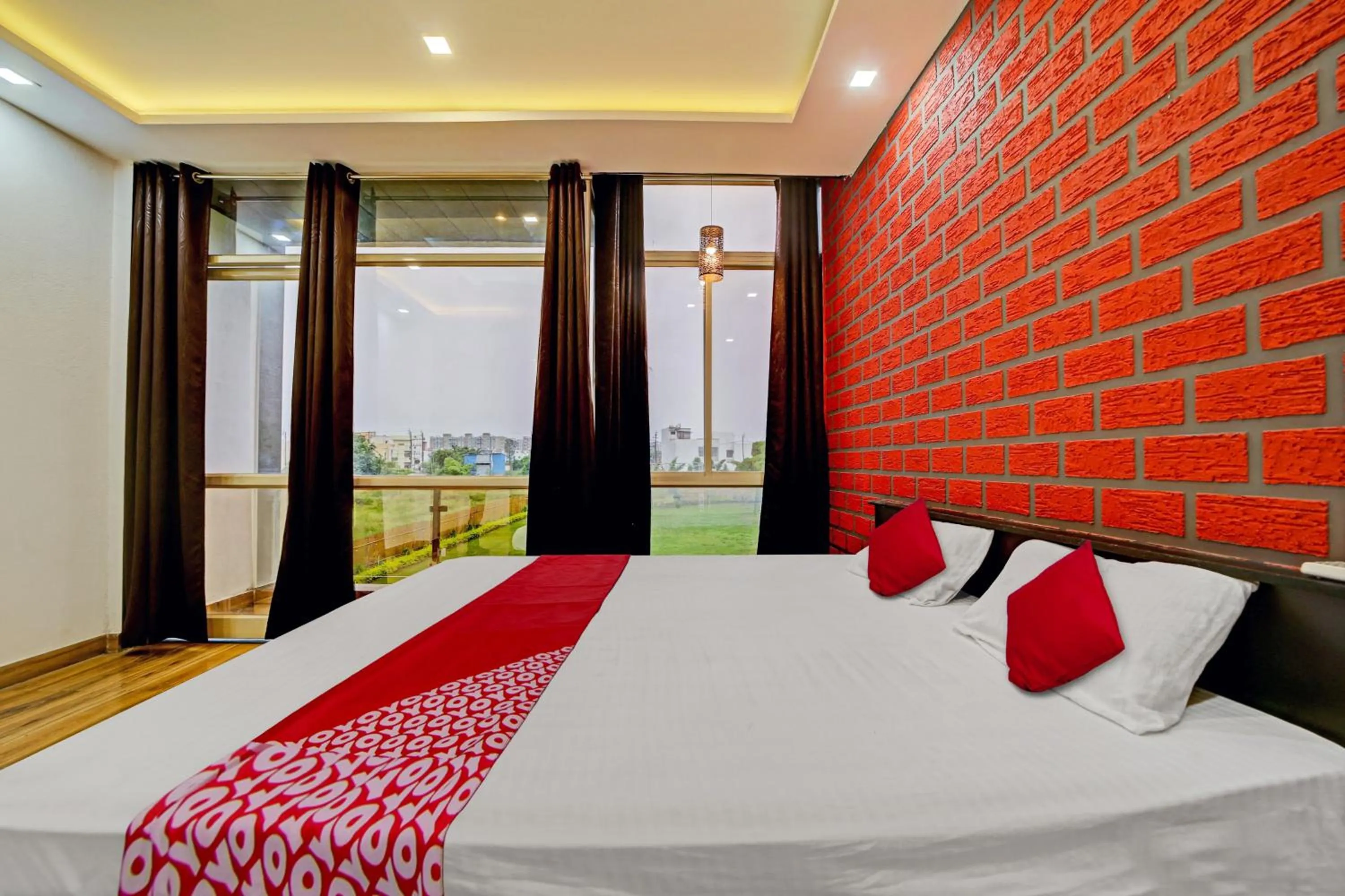Bedroom, Bed in Super Hotel O Vachan Garden And Resort
