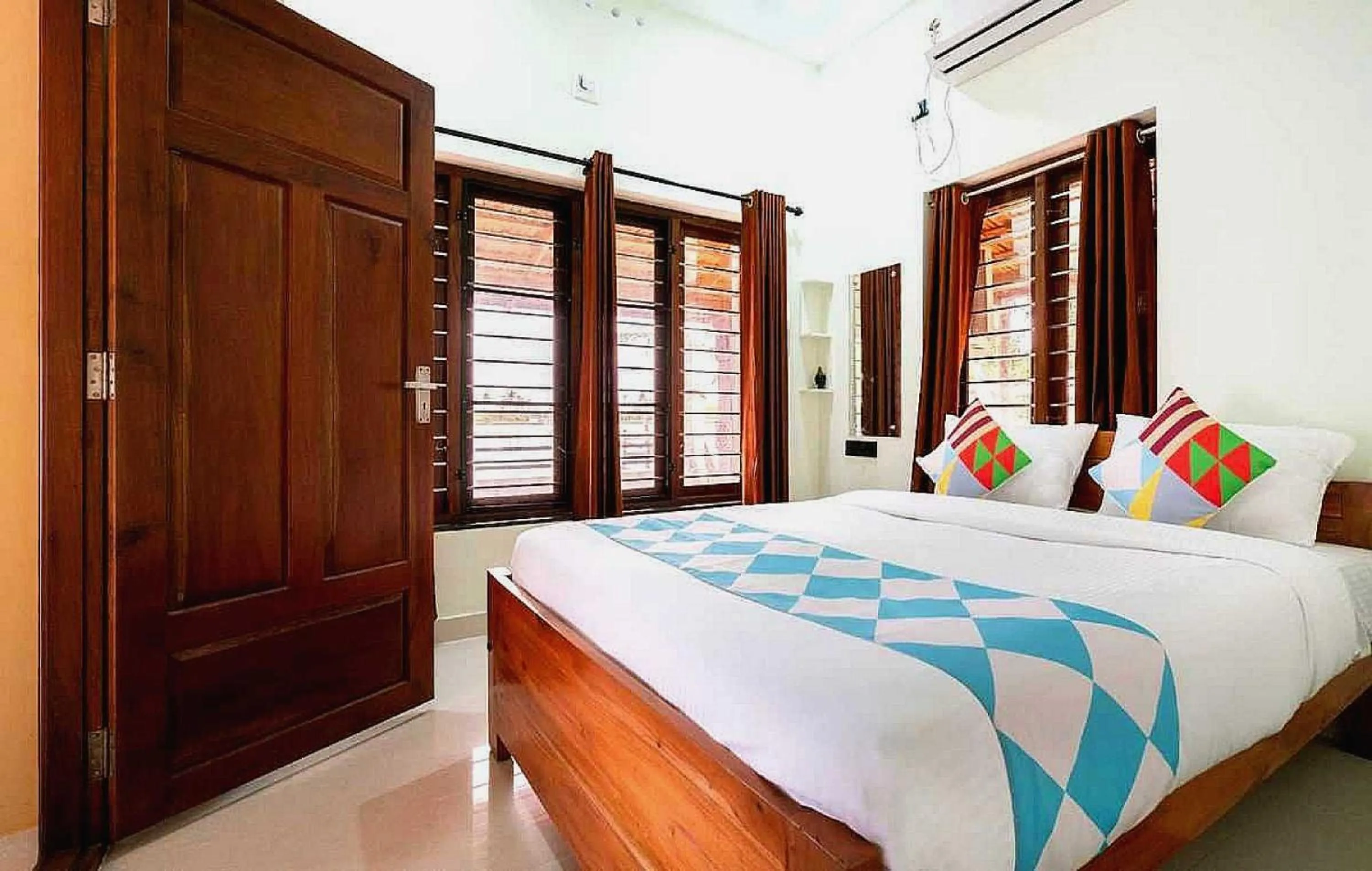 Bedroom in Hotel O ATHARVAM RESORT