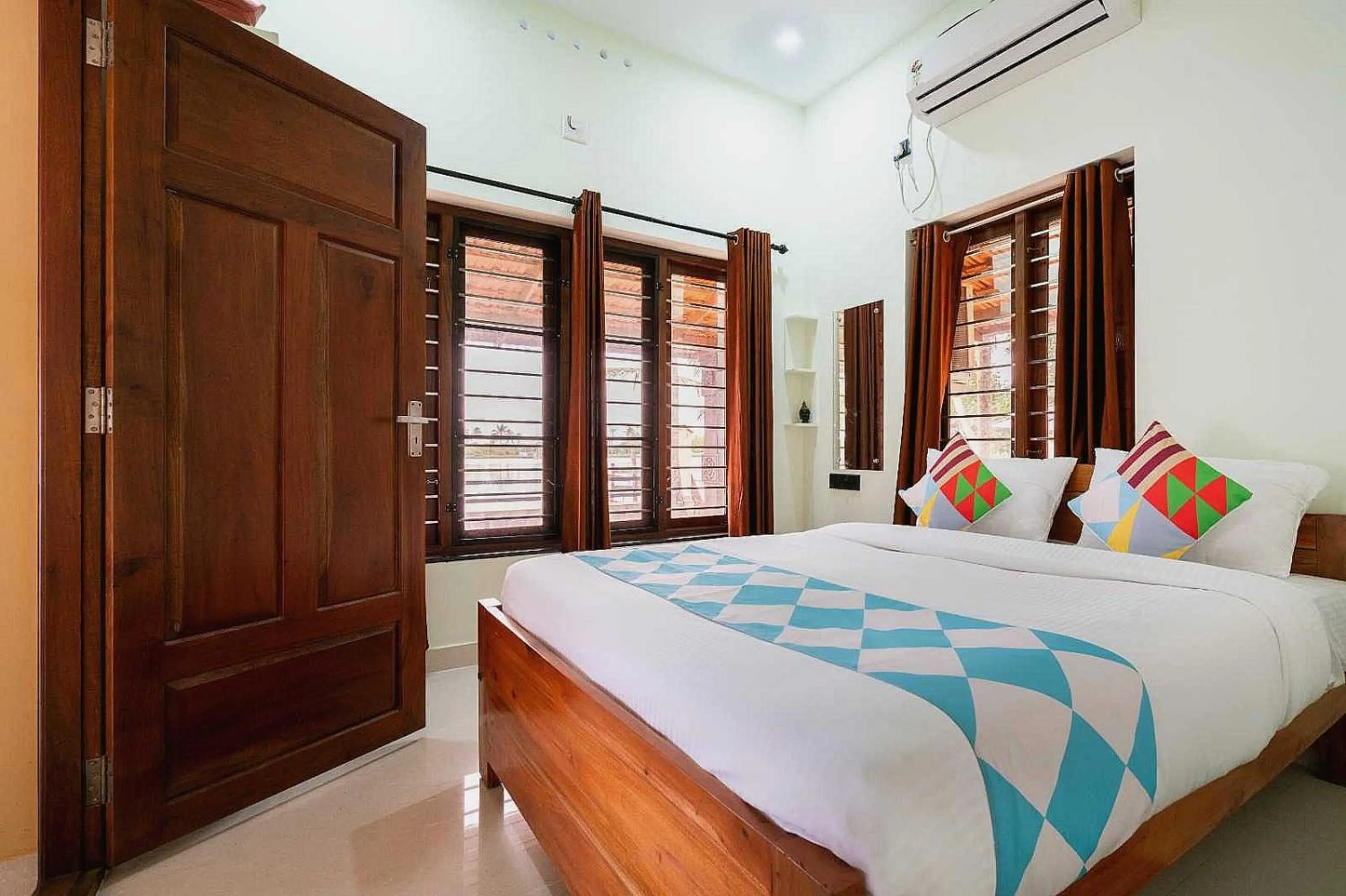 Bedroom in Hotel O ATHARVAM RESORT