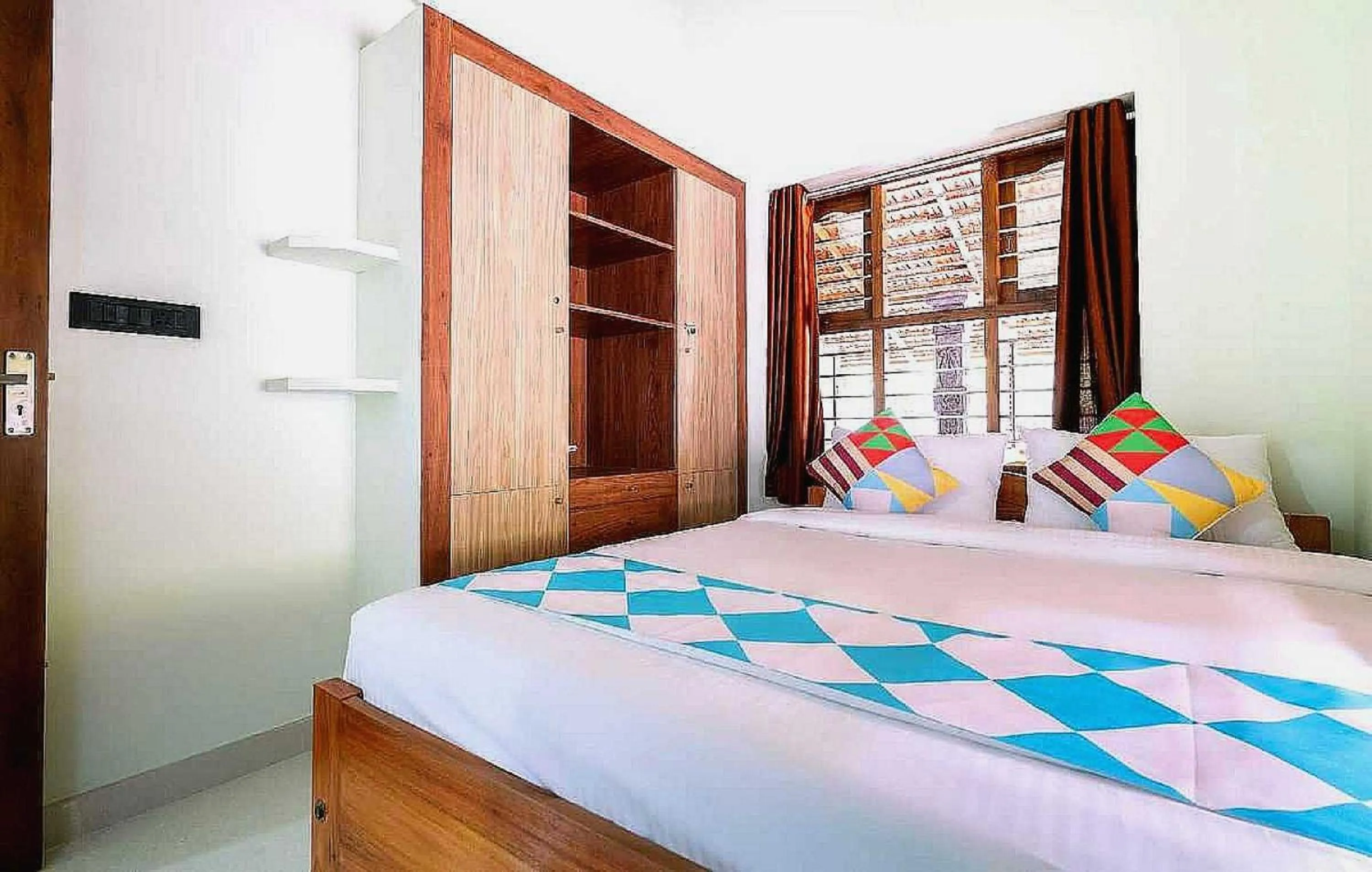 Bedroom in Hotel O ATHARVAM RESORT