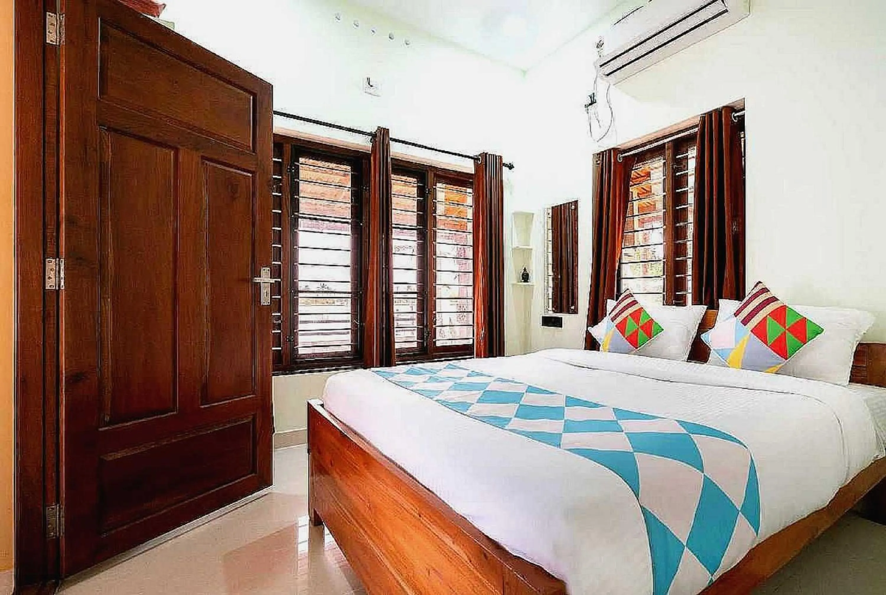 Bedroom in Hotel O ATHARVAM RESORT