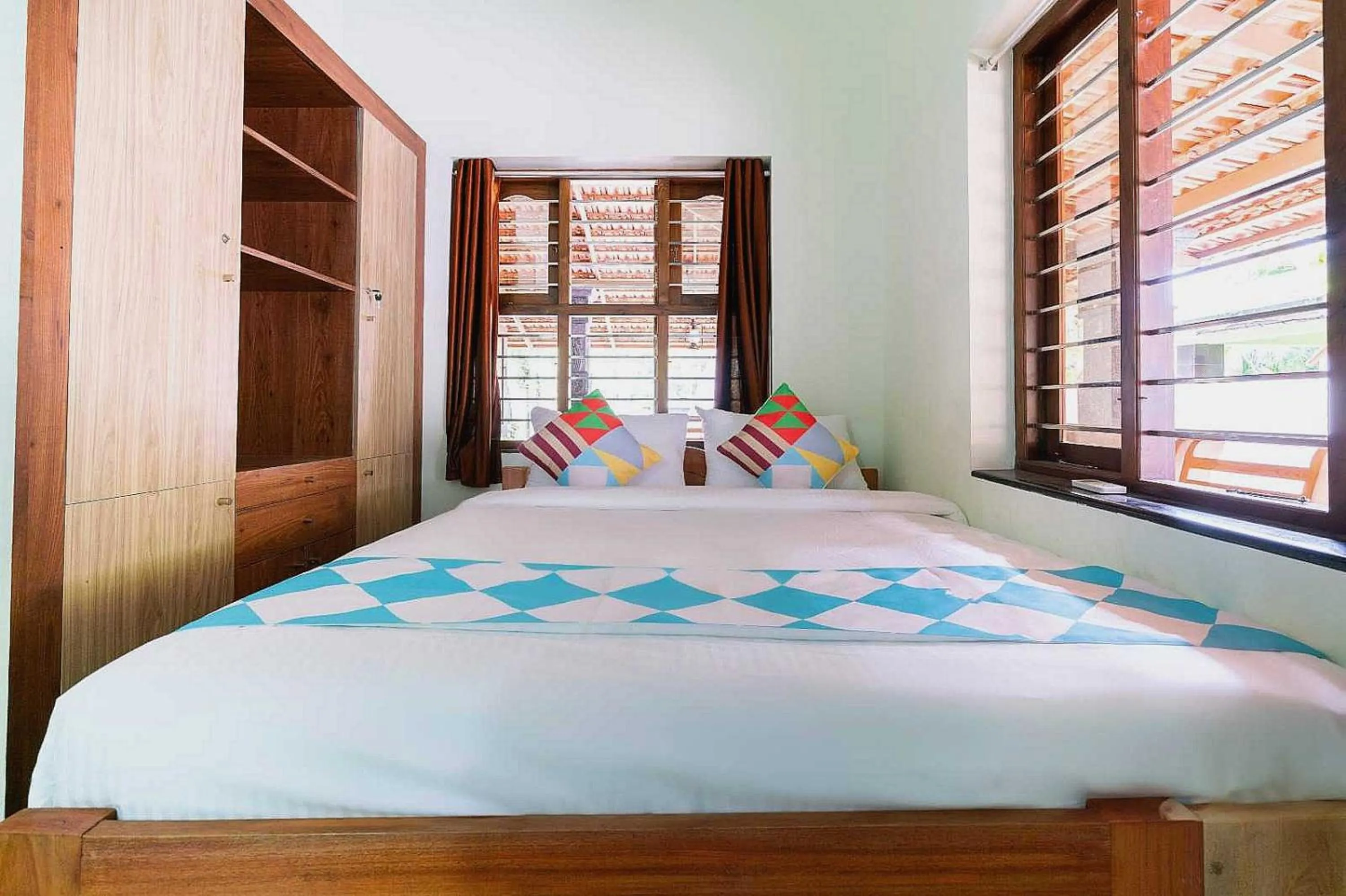 Bedroom in Hotel O ATHARVAM RESORT