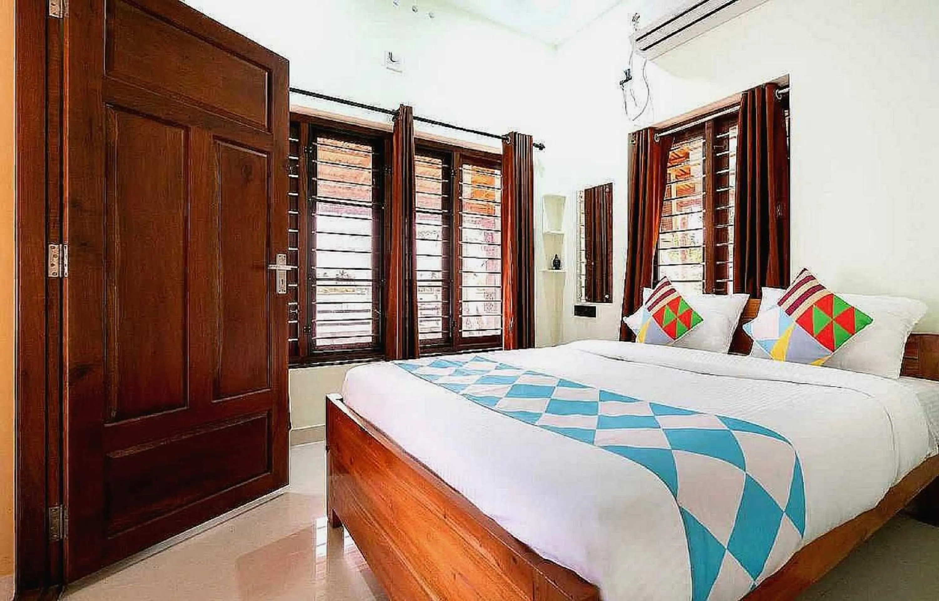 Bedroom in Hotel O ATHARVAM RESORT