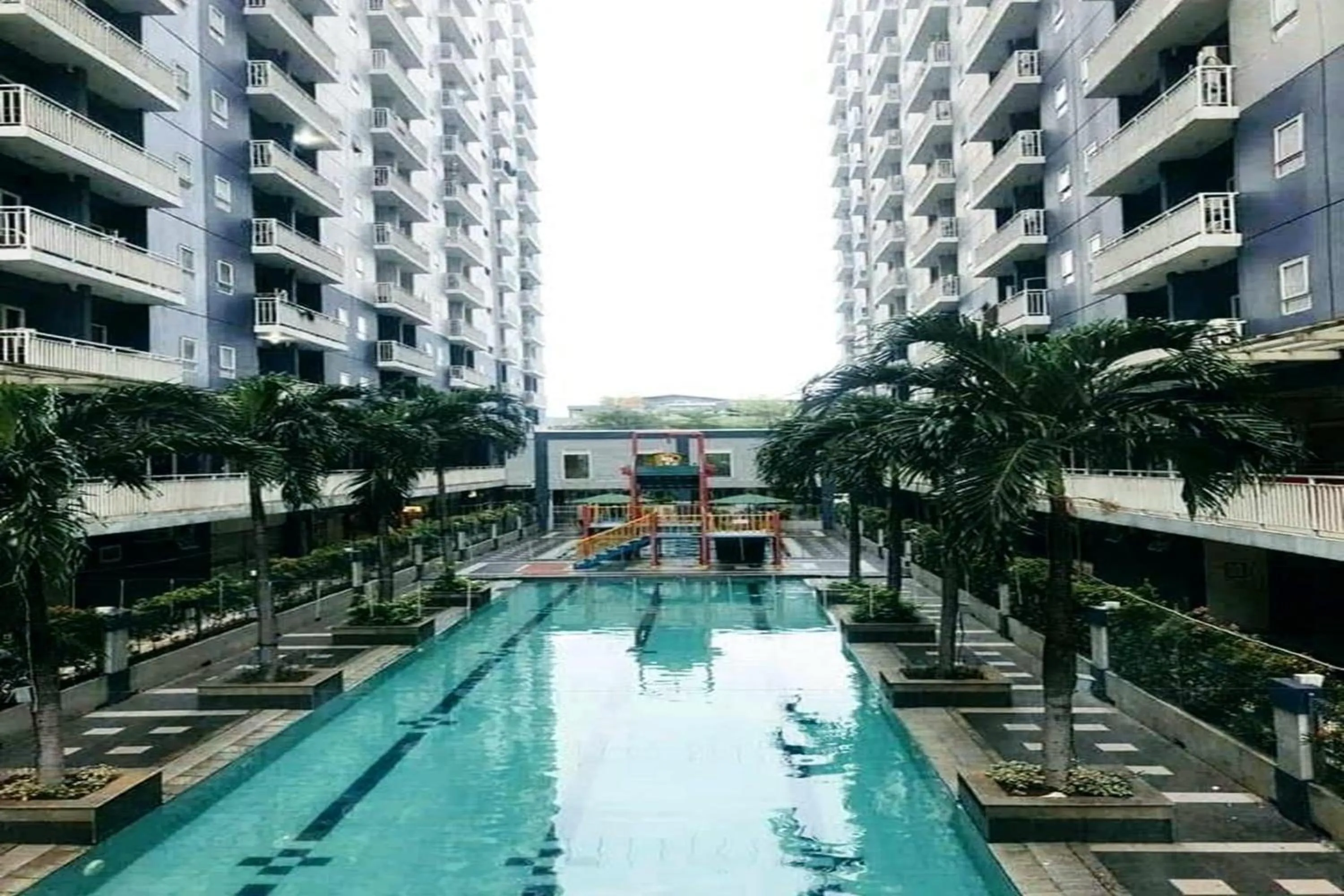 Pool view in Queen Room 2 @ Grand Center Point Apartment
