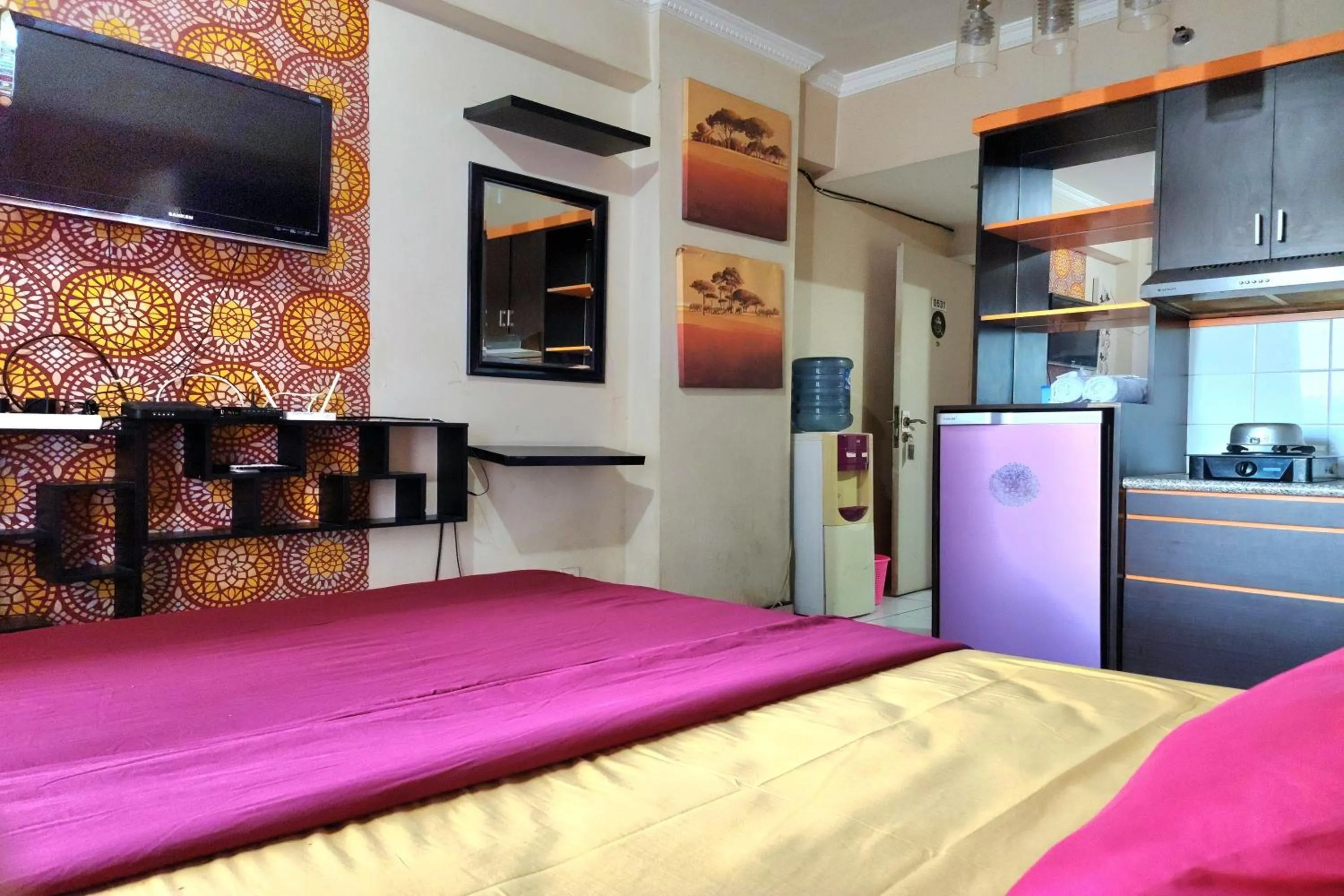 Bed in Queen Room 2 @ Grand Center Point Apartment