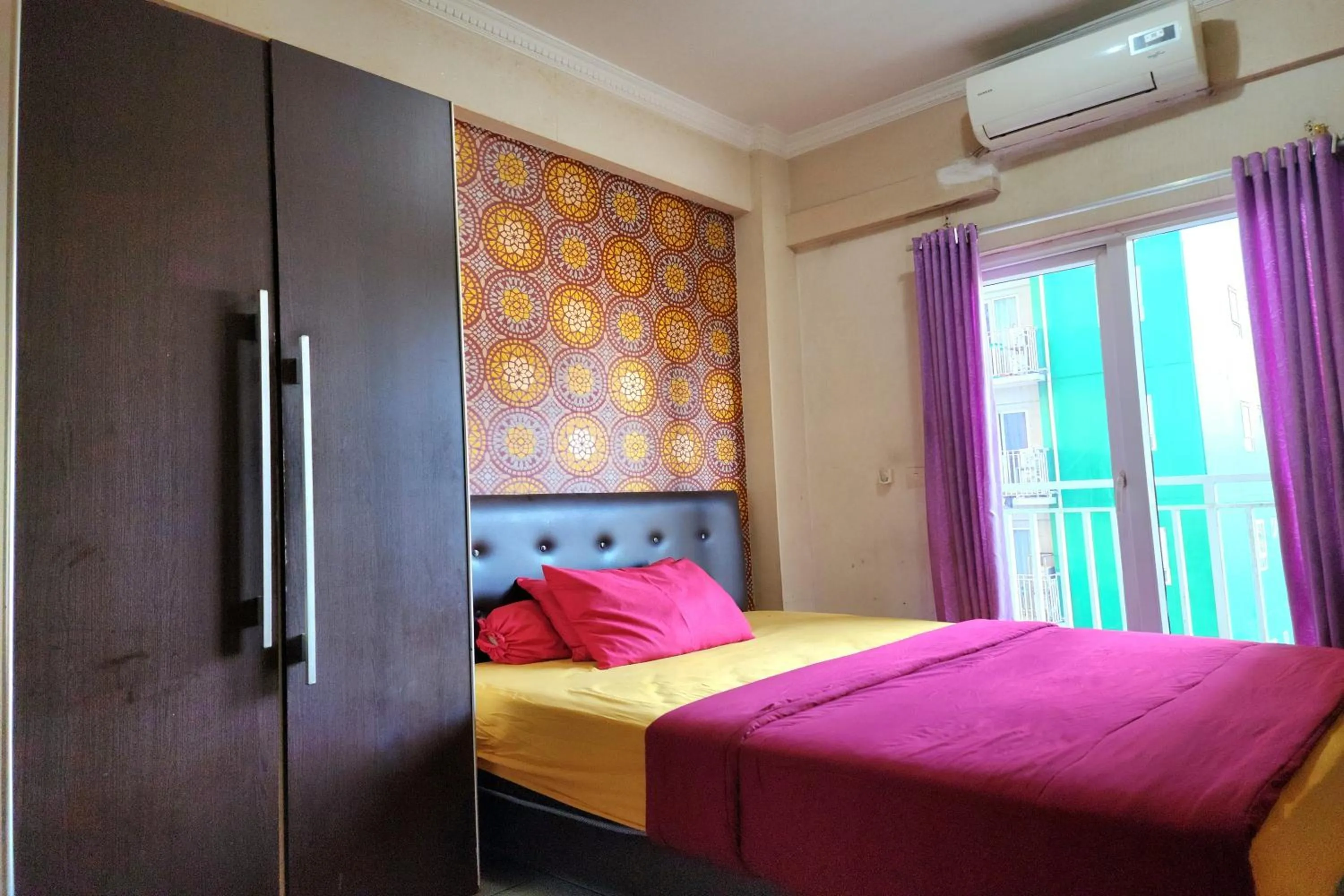 Bed in Queen Room 2 @ Grand Center Point Apartment