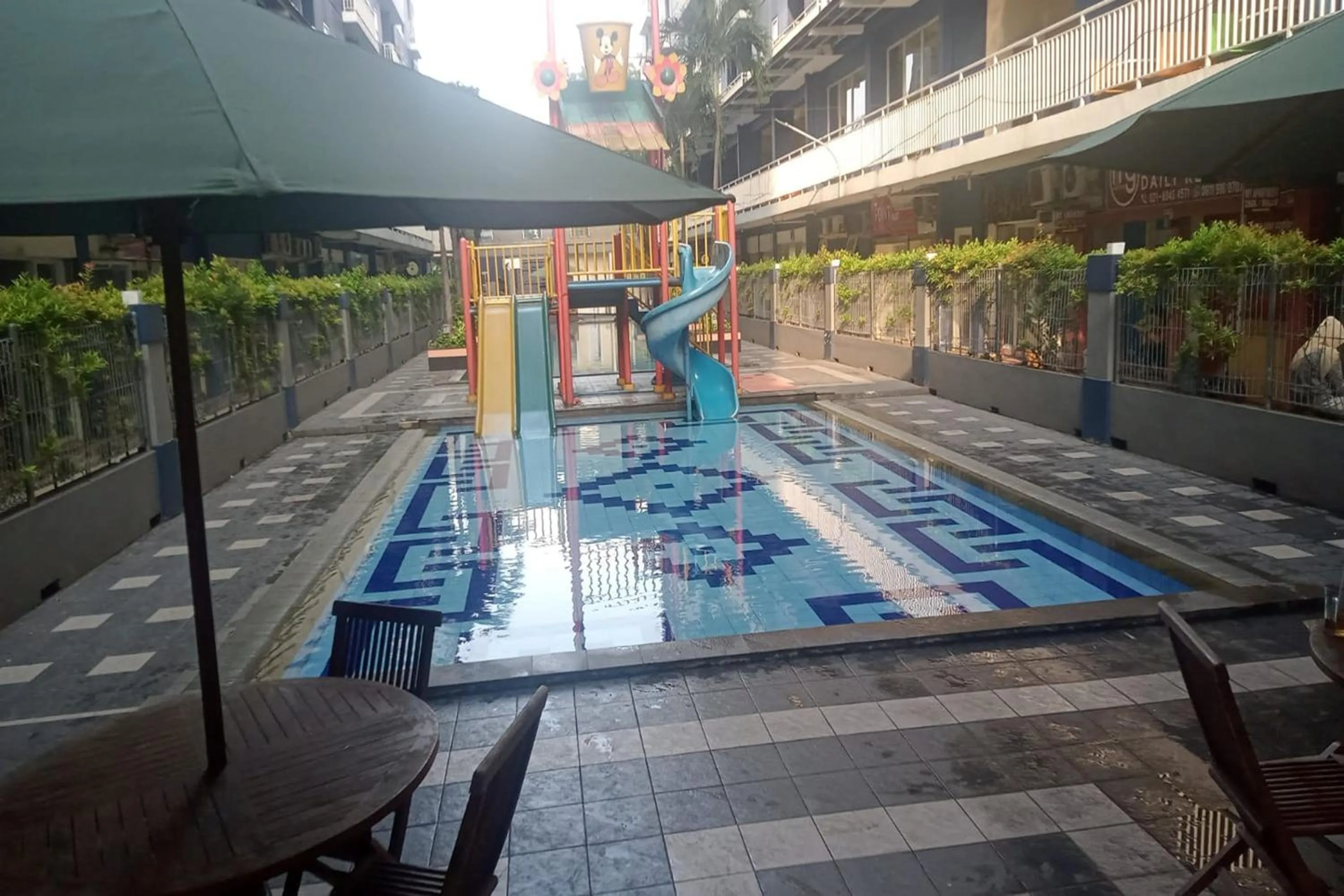 Swimming pool in Queen Room 2 @ Grand Center Point Apartment