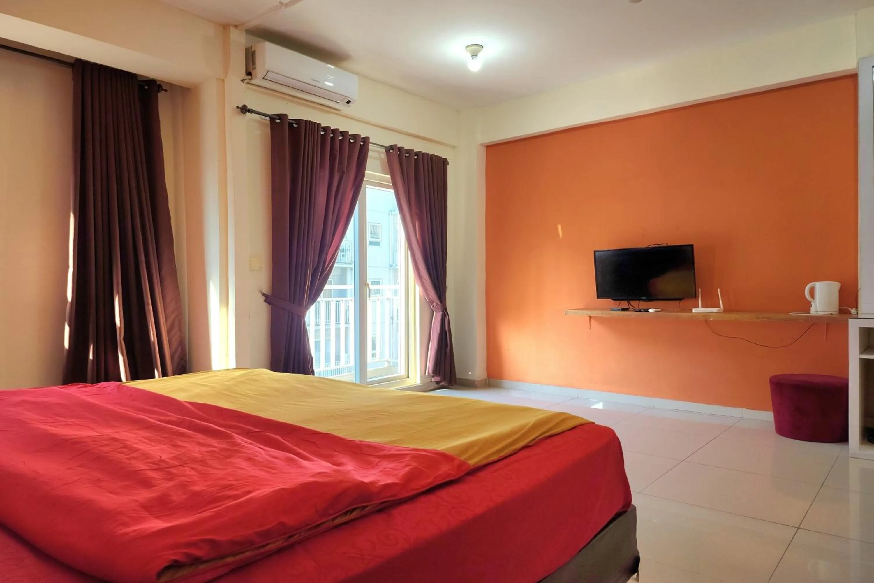 Bed in Queen Room 2 @ Grand Center Point Apartment