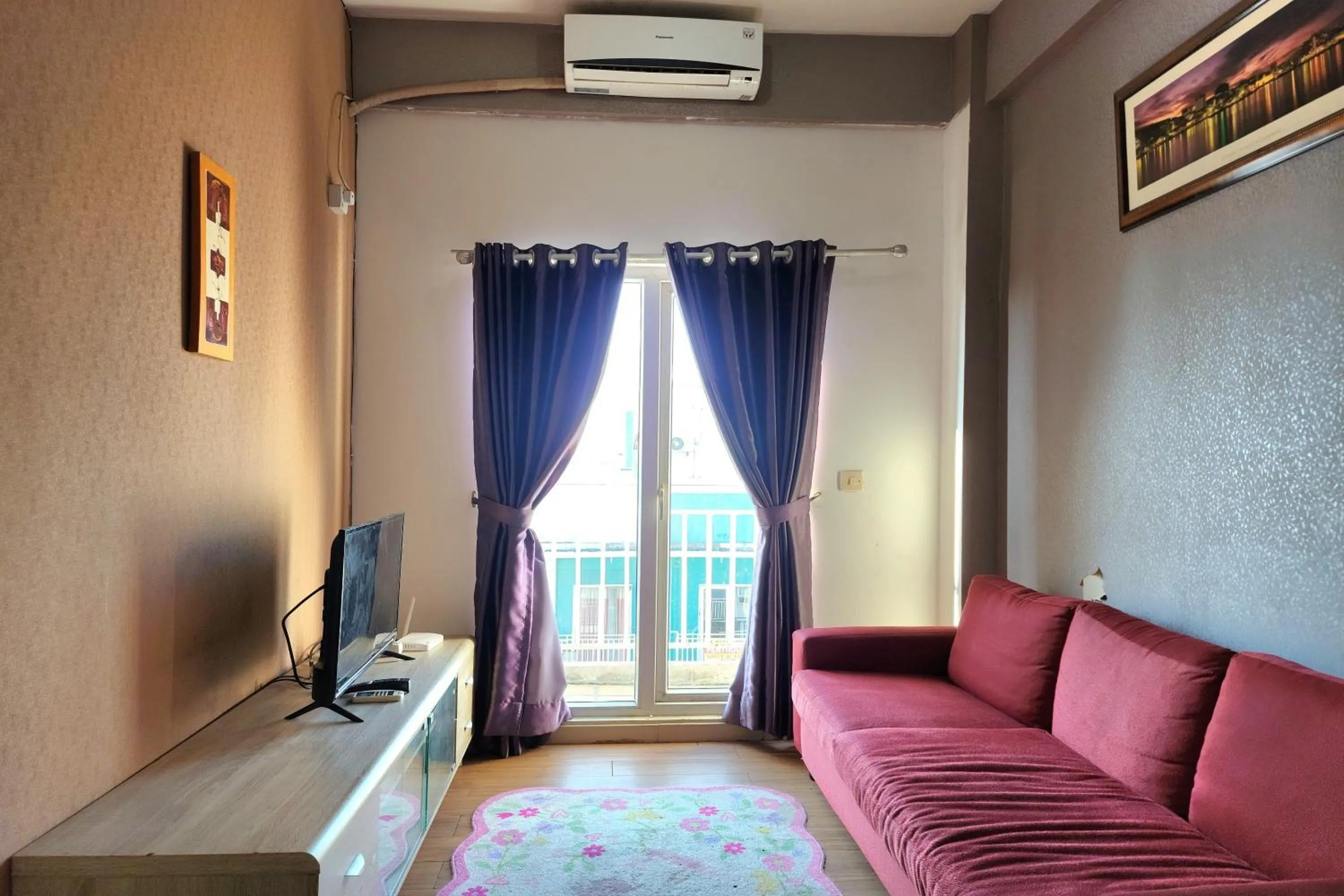 Living room in Queen Room 2 @ Grand Center Point Apartment